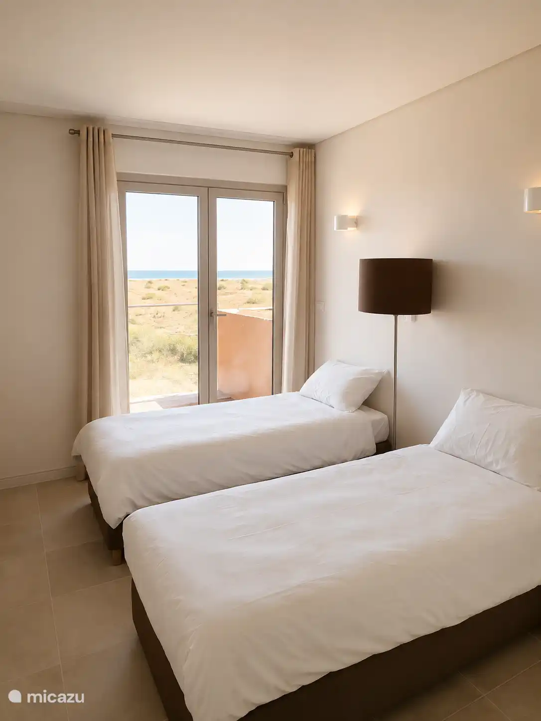 Slaapkamer 2 met zeezicht en airco