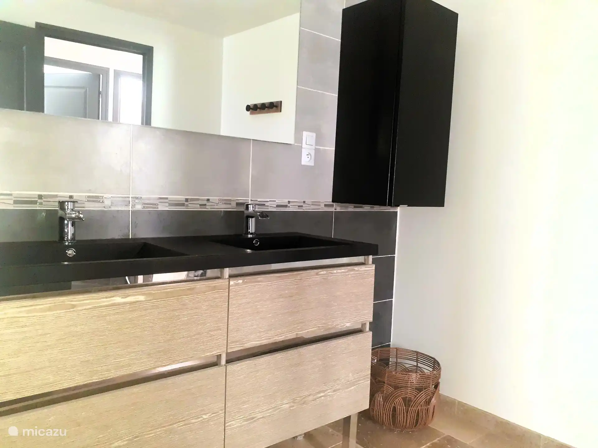 De badkamer