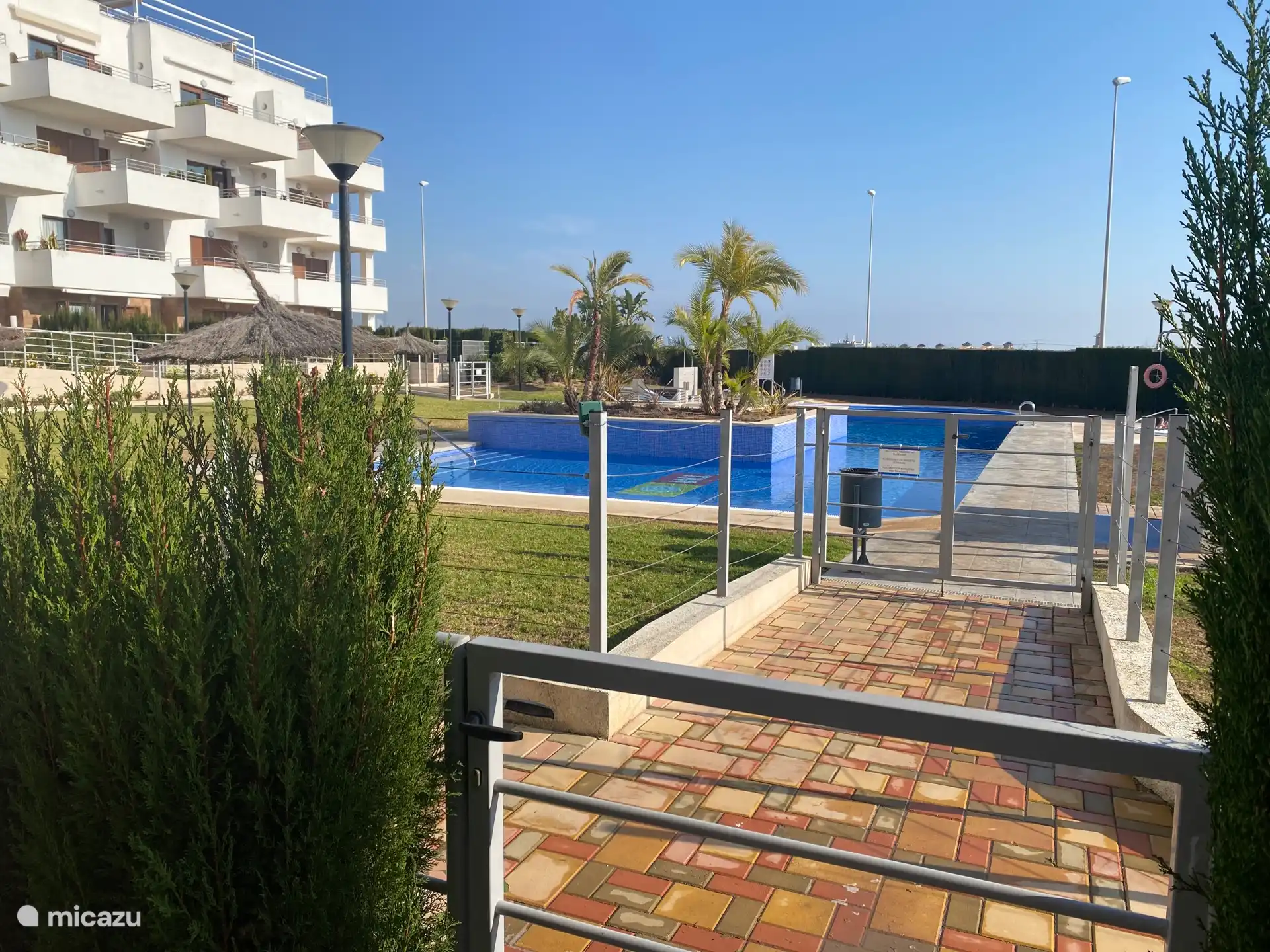 Pool view from terrace/garden apartment.
