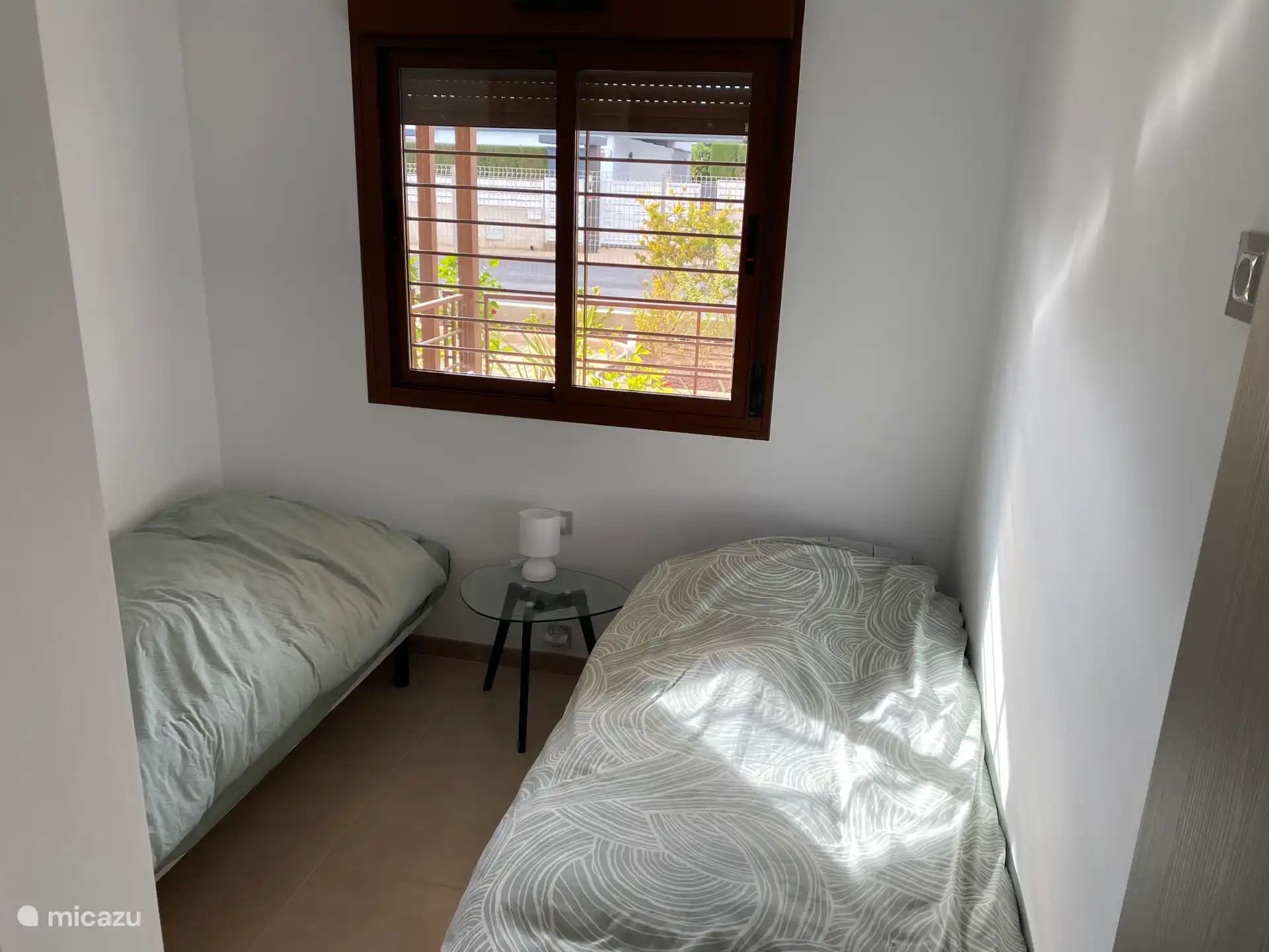 Bedroom 2, with 2 single beds.