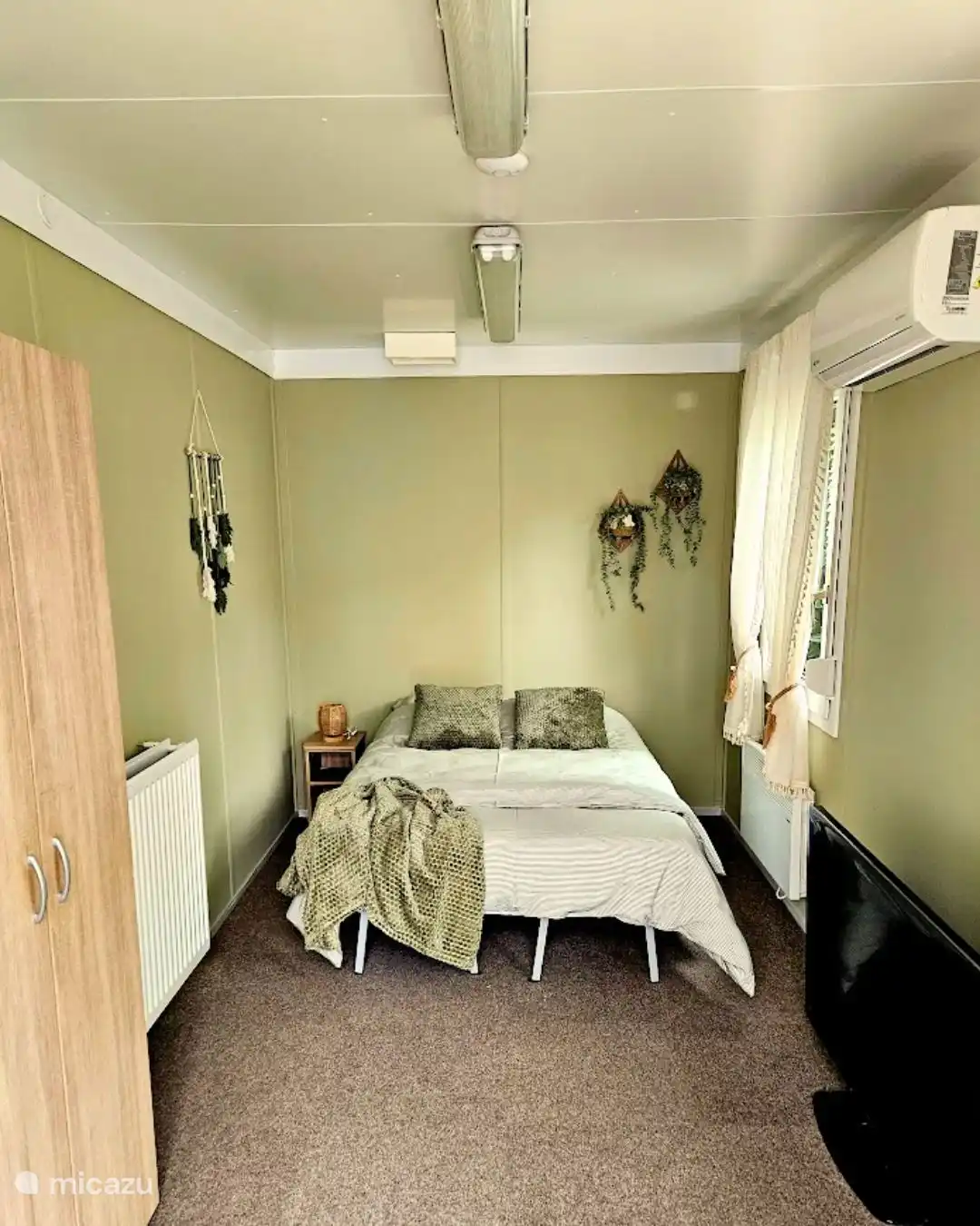 Dormitorio en la ampliación/invernadero