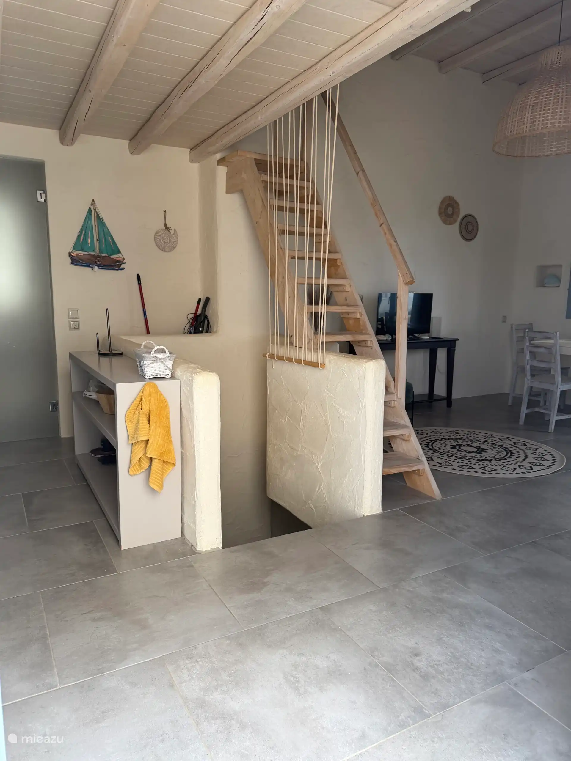 Living room with access to large bedroom downstairs