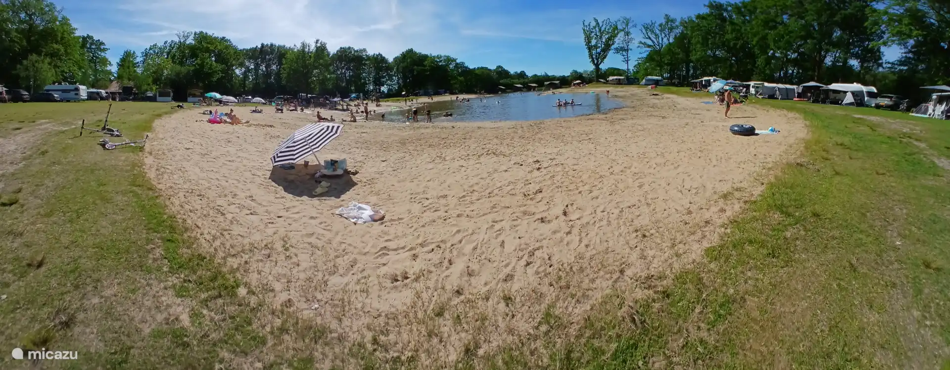 Natural swimming pond of the campsite.