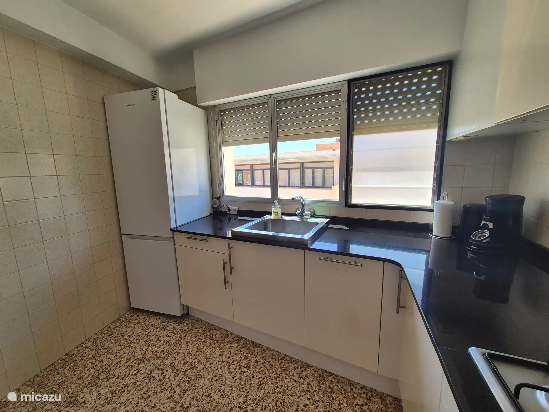 Kitchen and refrigerator