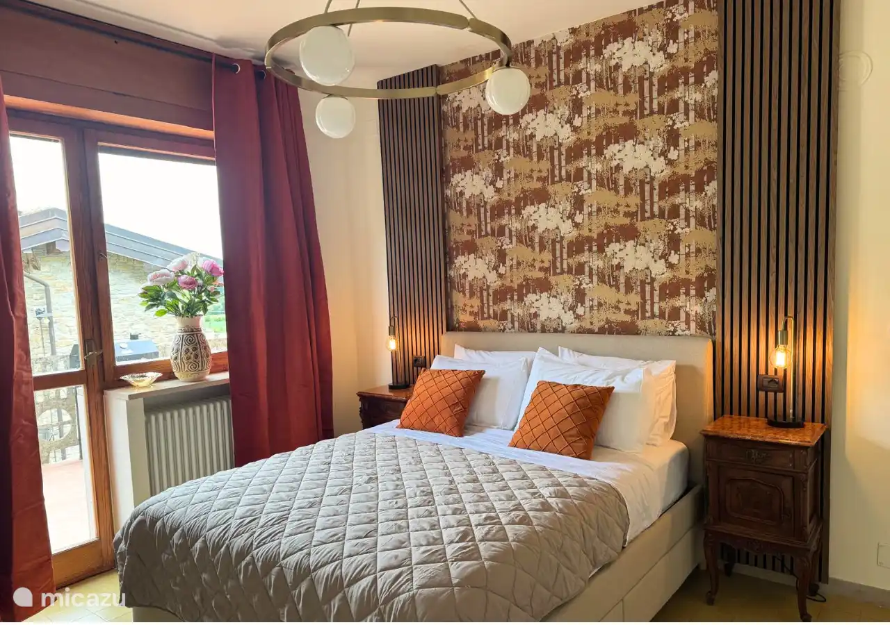 Schlafzimmer 3 mit einem 160 cm großen Boxspring liegt direkt an die Terrasse.