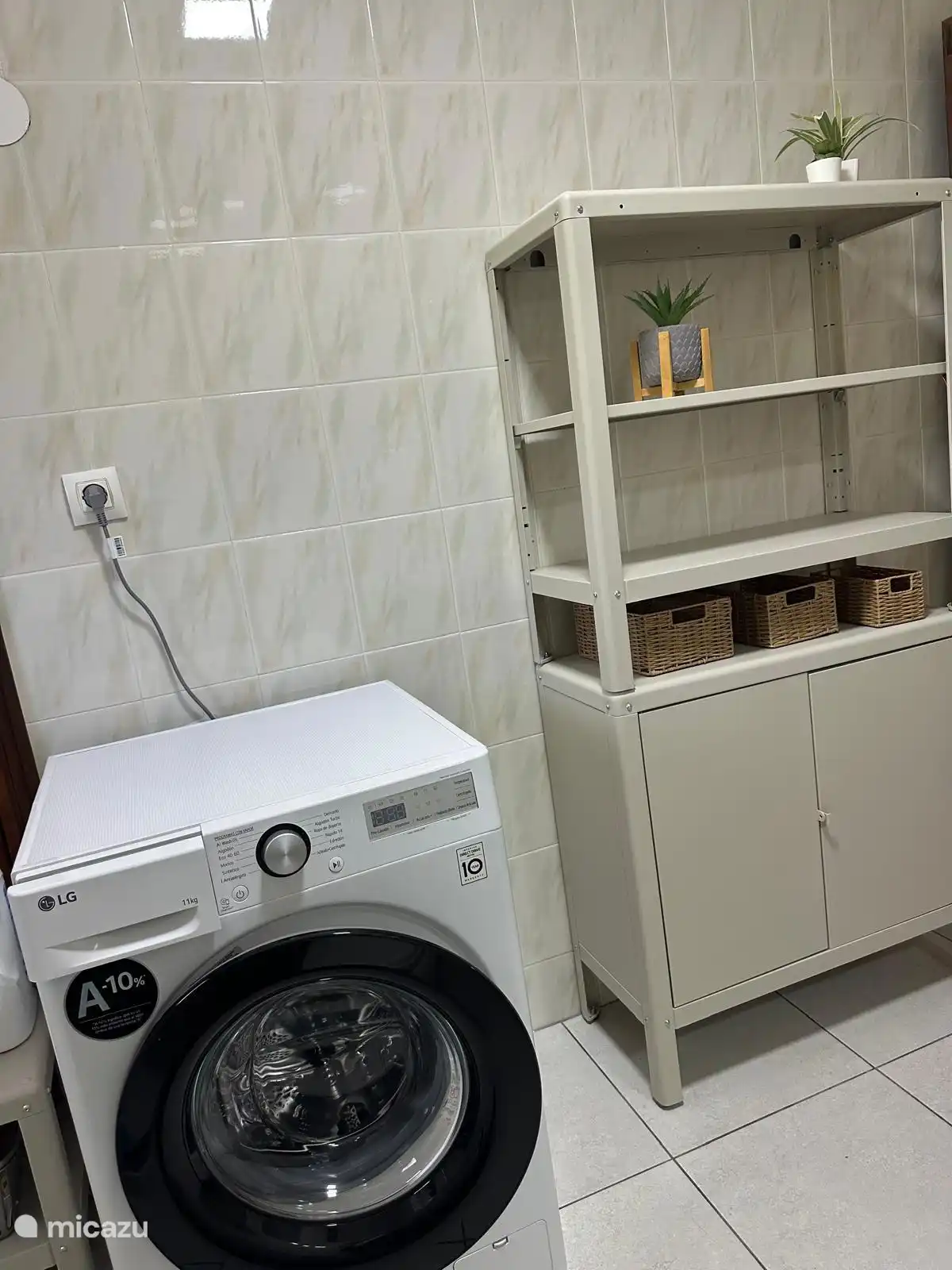 casa Querencia, wasmachine in de badkamer beneden