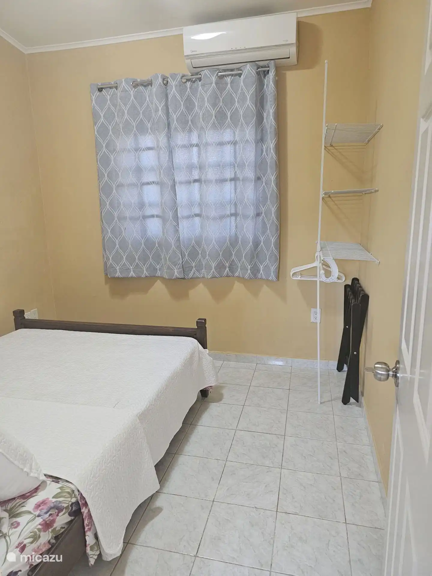Bedroom 2 also equipped with air conditioning and clothes racks