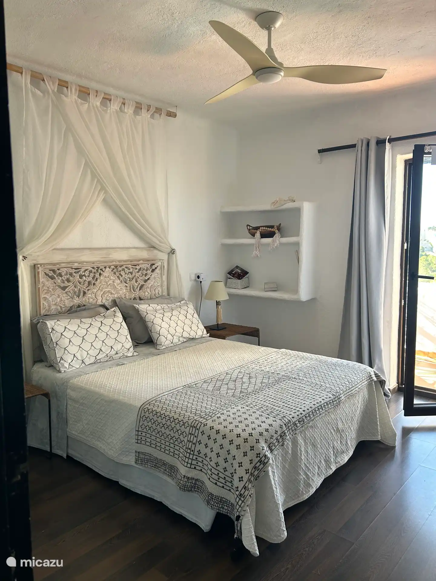 Comfortable bedroom with terrace and wardrobes, fan 