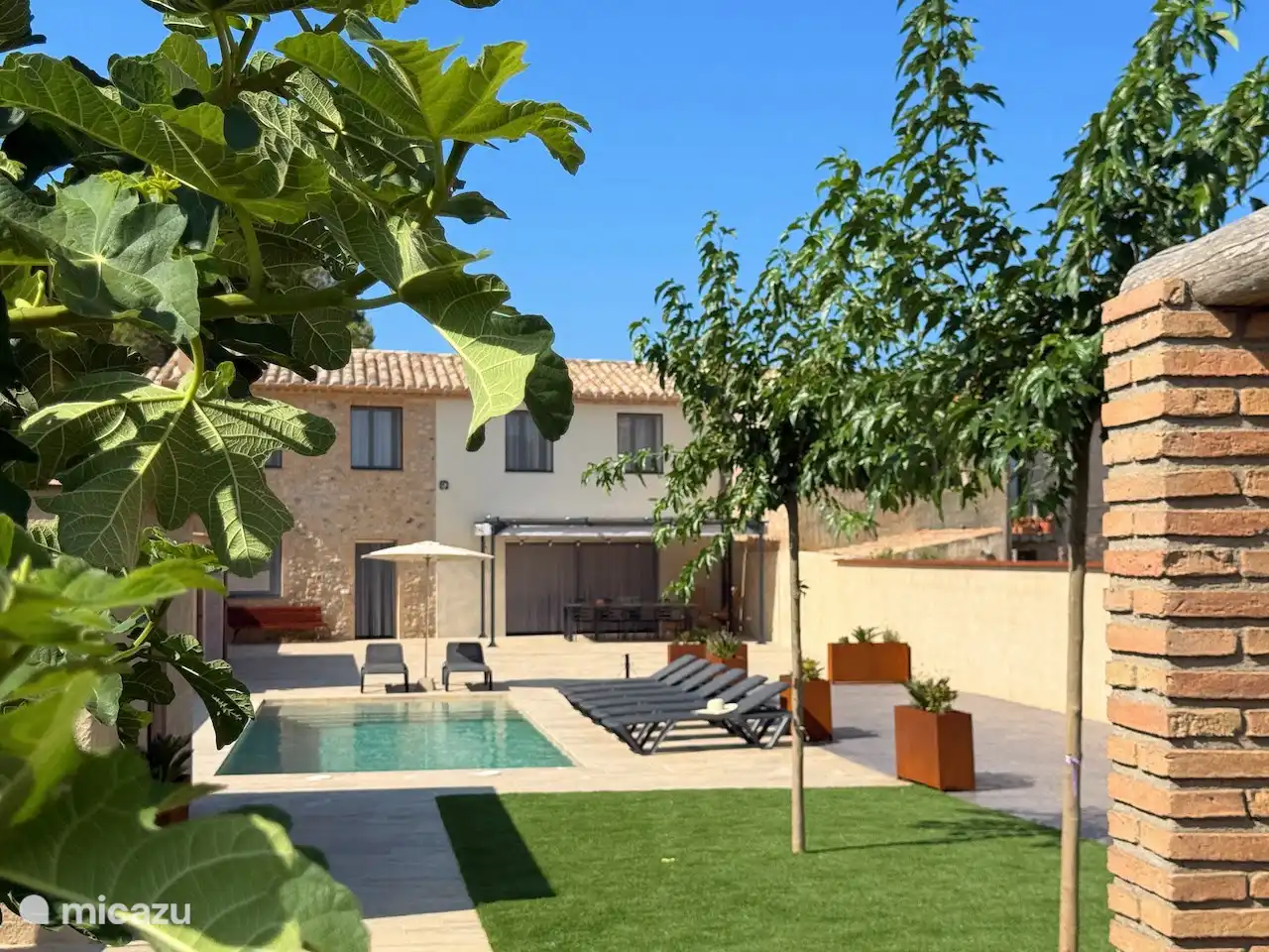 The beautiful garden with private swimming pool, and authentic details such as an old well.