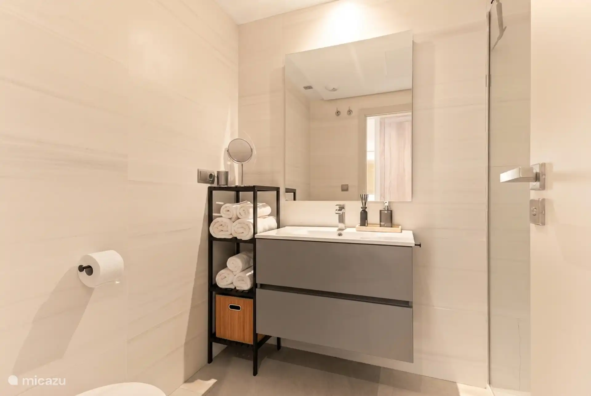 Second bathroom with sink and fresh towels