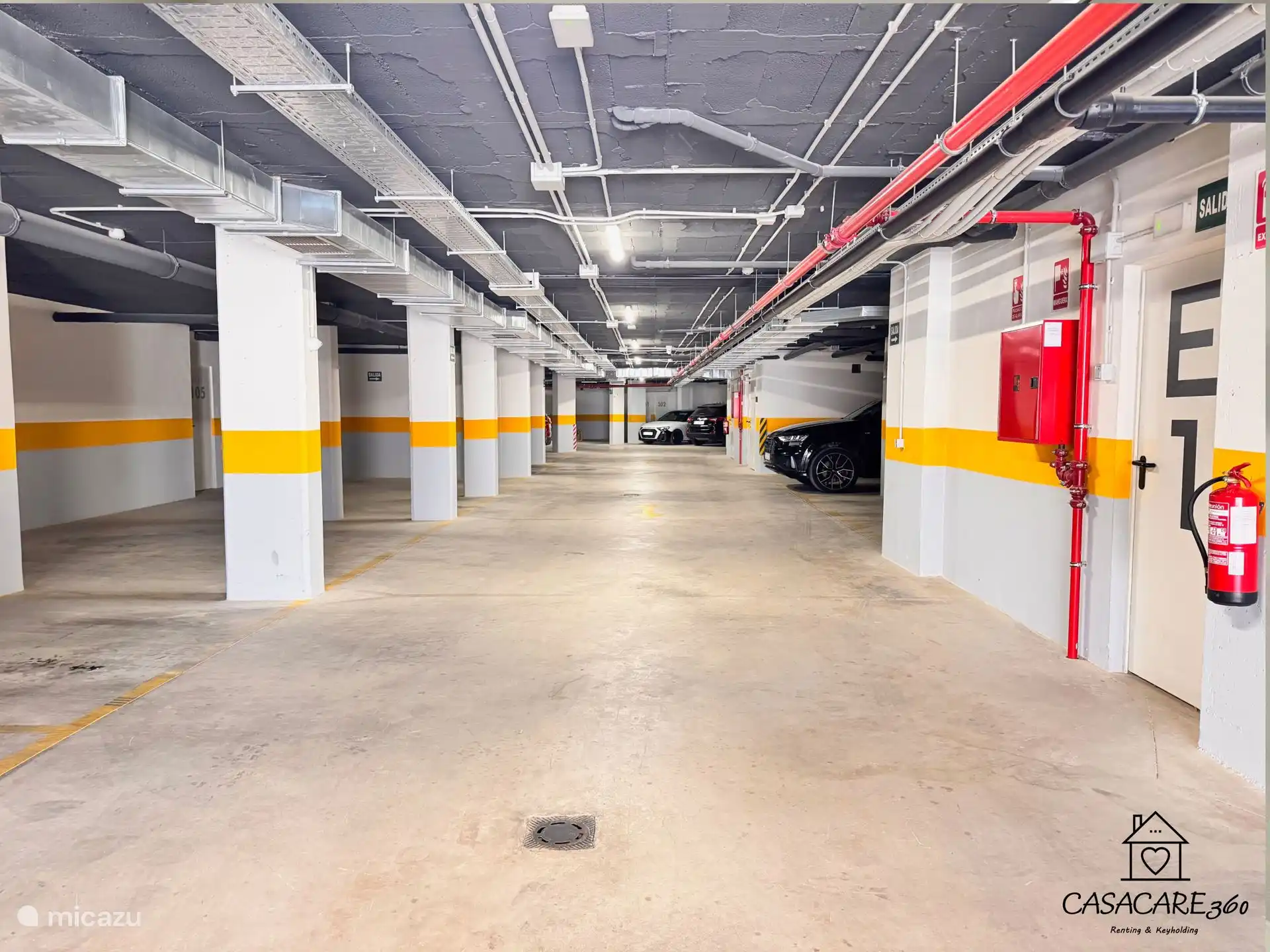 The underground car park. A private parking space is included with the apartment.
