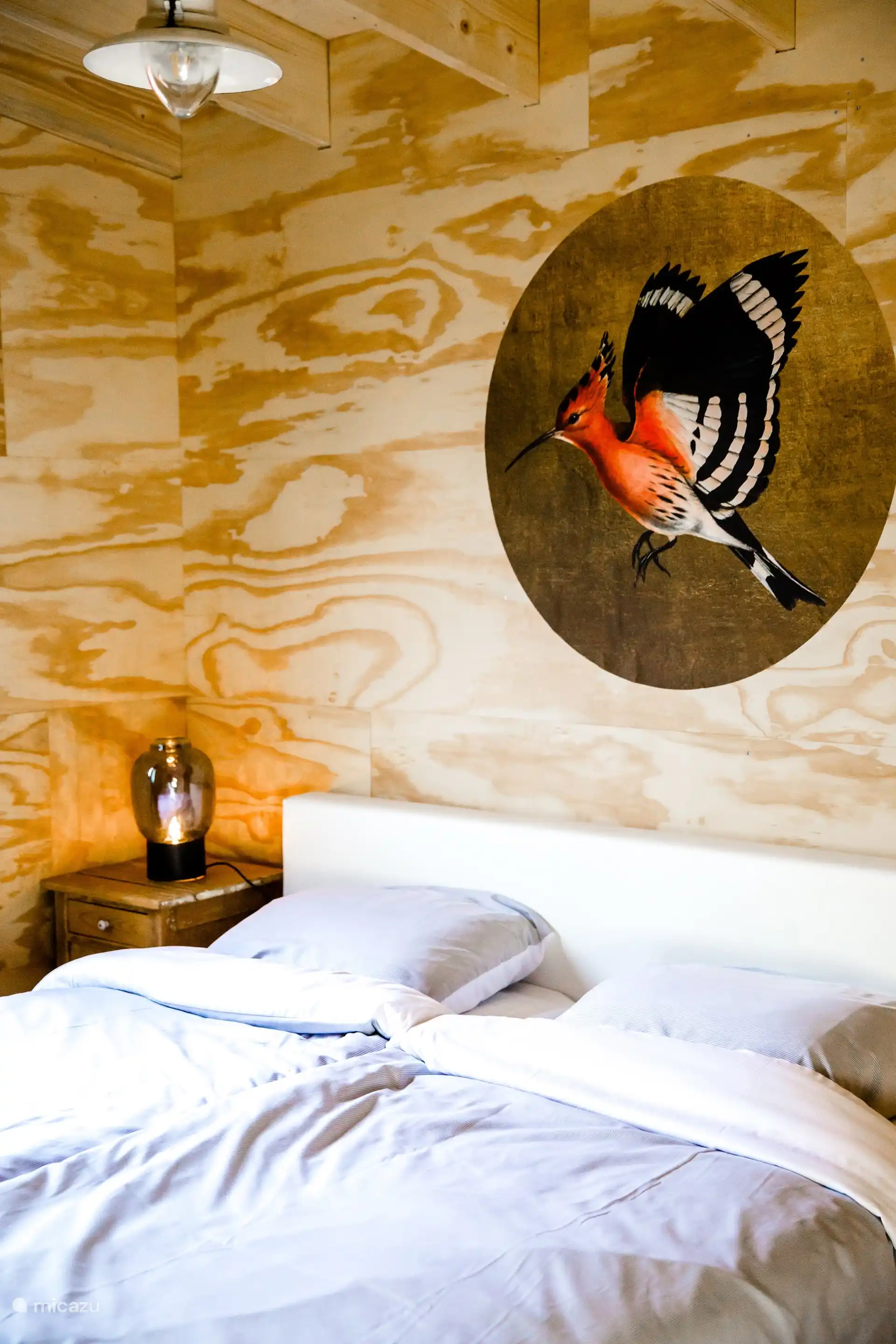 Slaapkamer met comfortabel tweepersoonsbed.