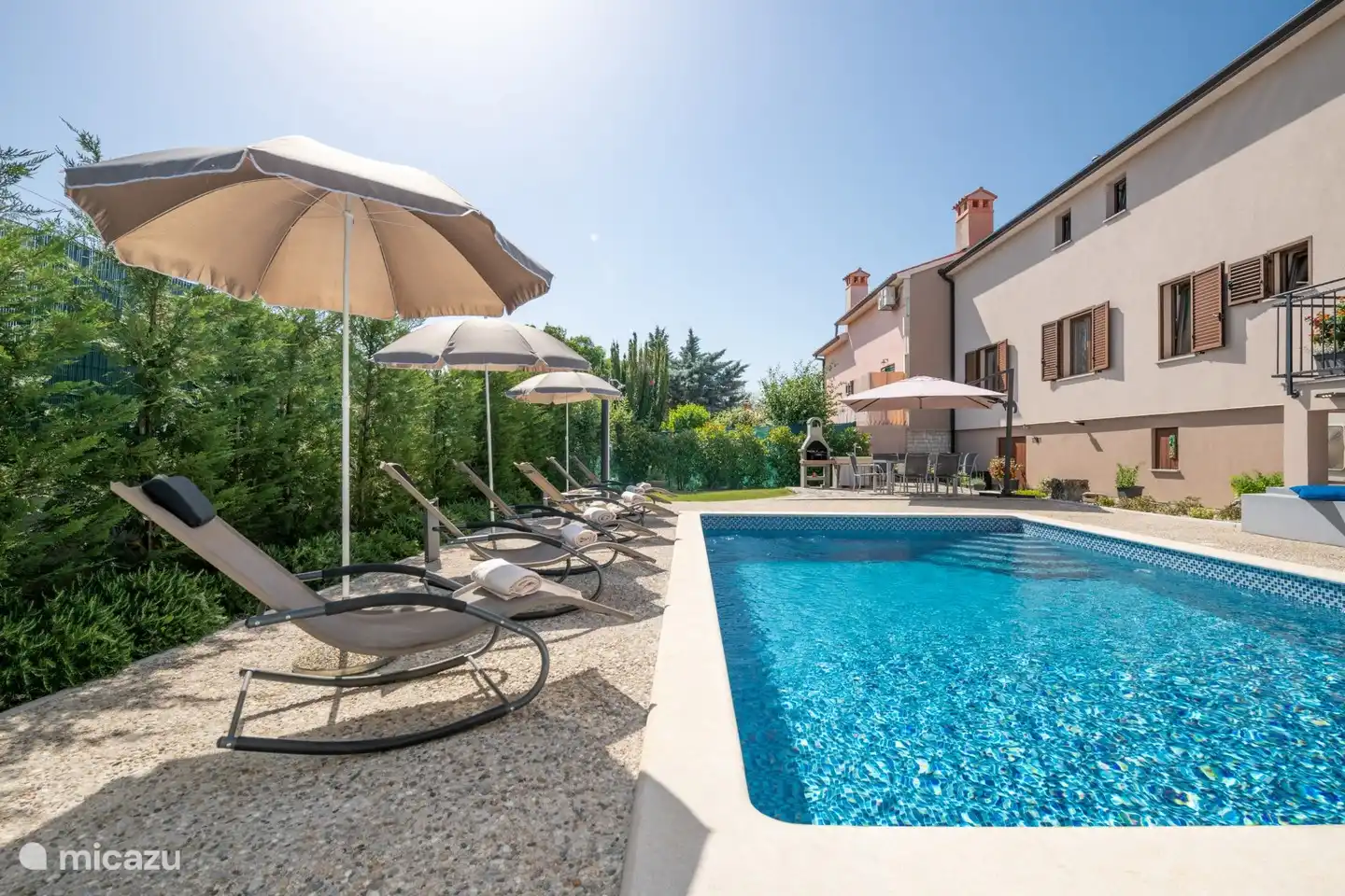 swimming pool + sunbeds