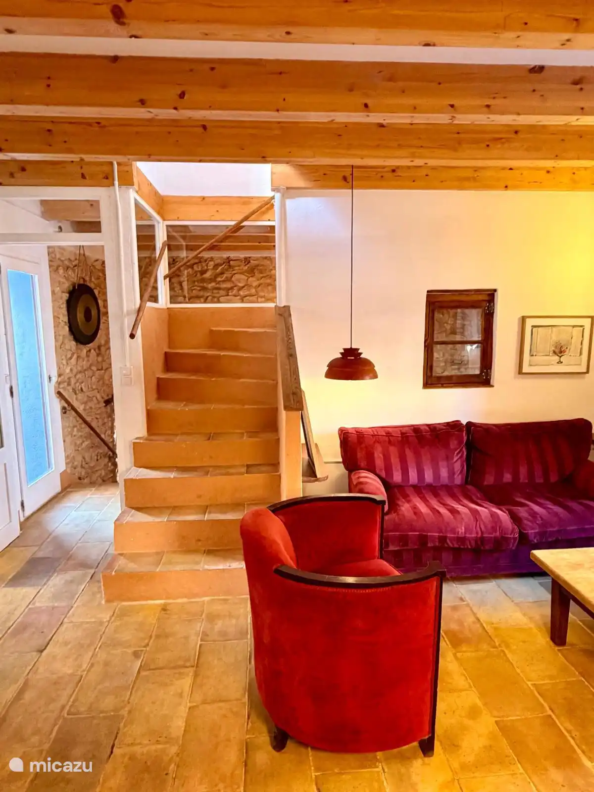 Living room with stairs to second floor