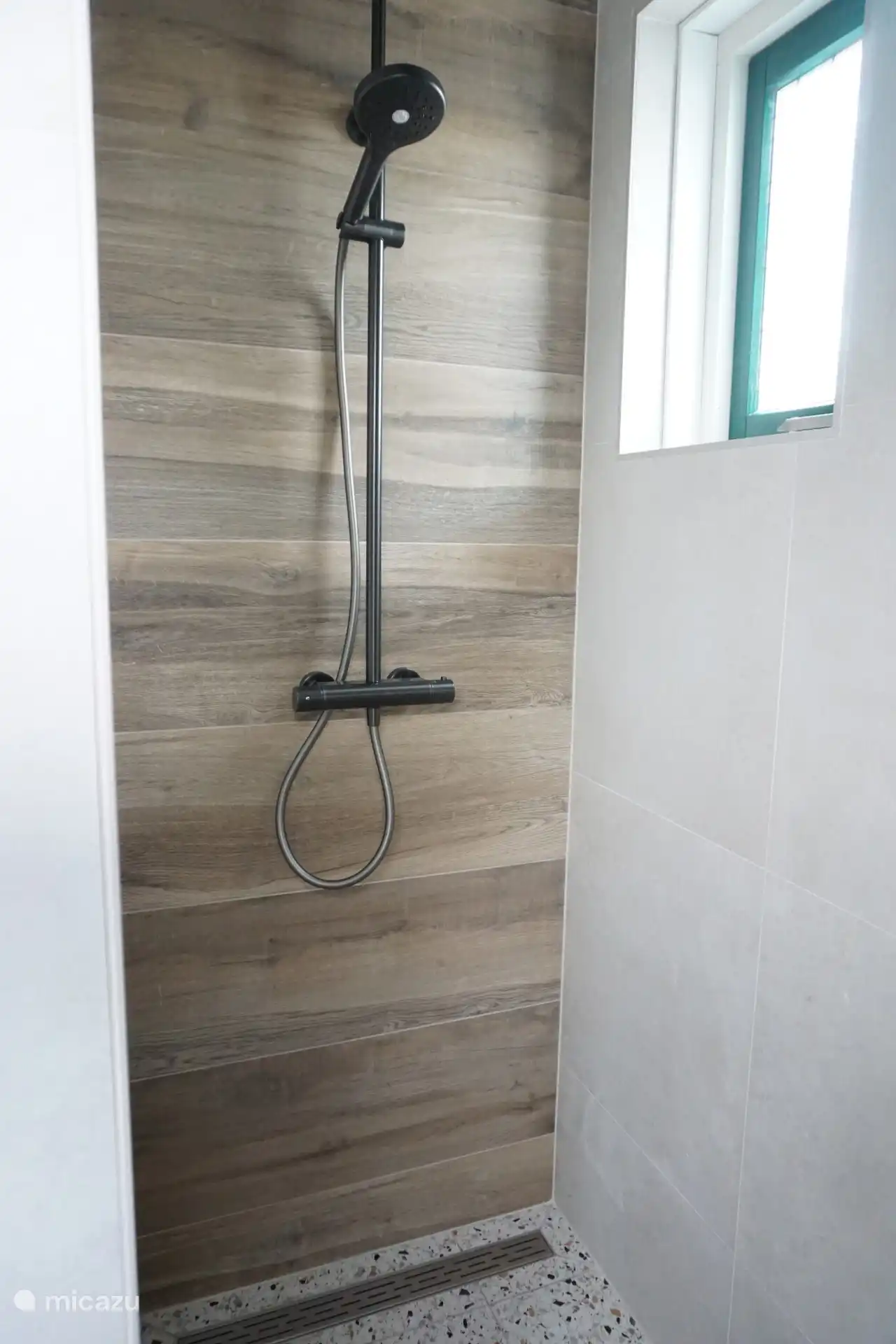 Ducha con acceso a pie en la planta baja