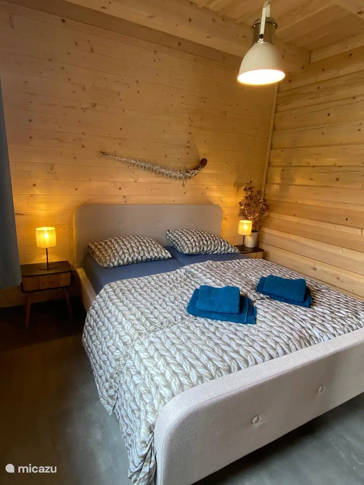 Downstairs bedroom double bed 160 wide.
two separate mattresses and duvets
