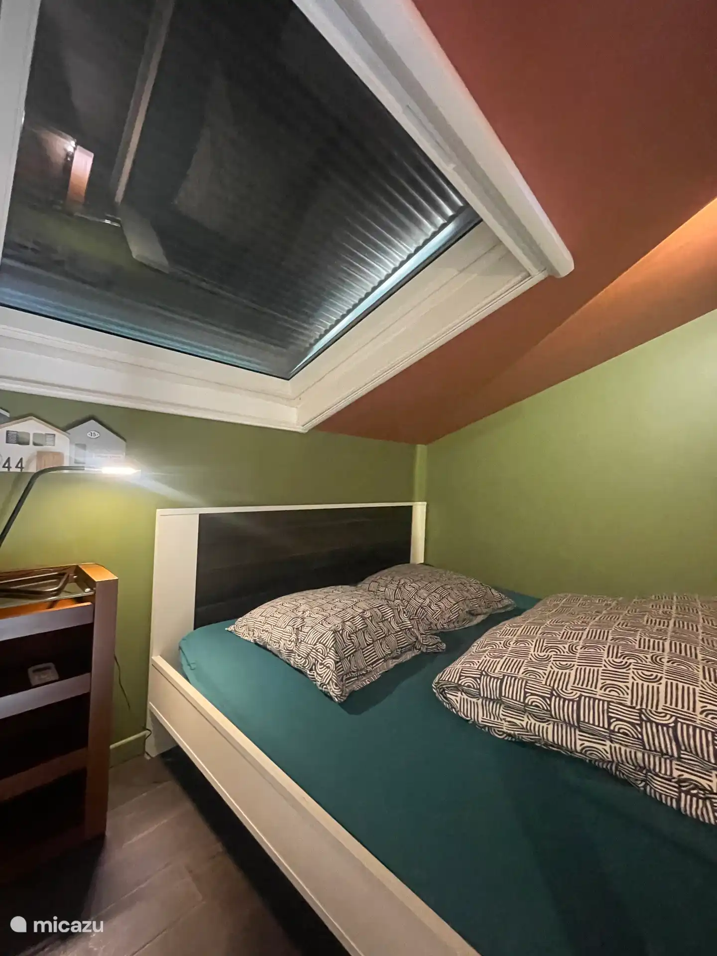 Kamer met Velux en rolluik 