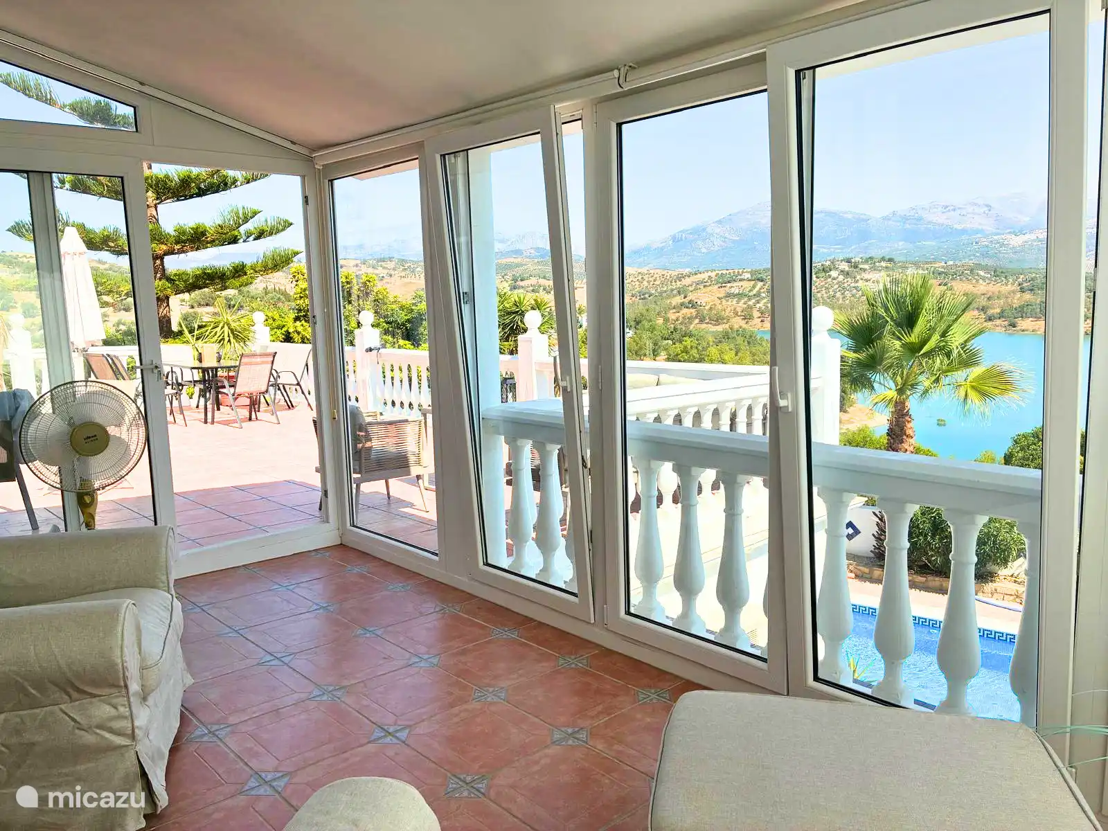 Walk onto the upper terrace from the sun room