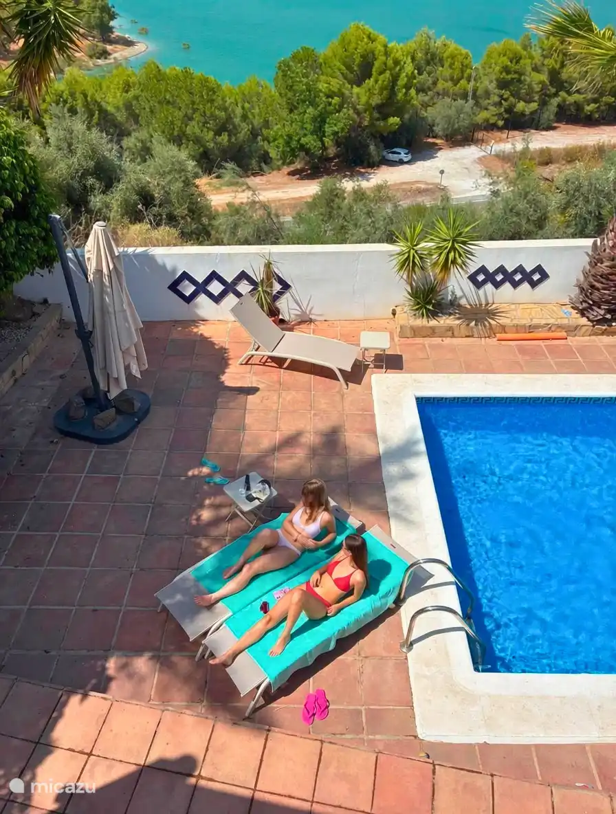 Relax on one of the sun loungers at the pool