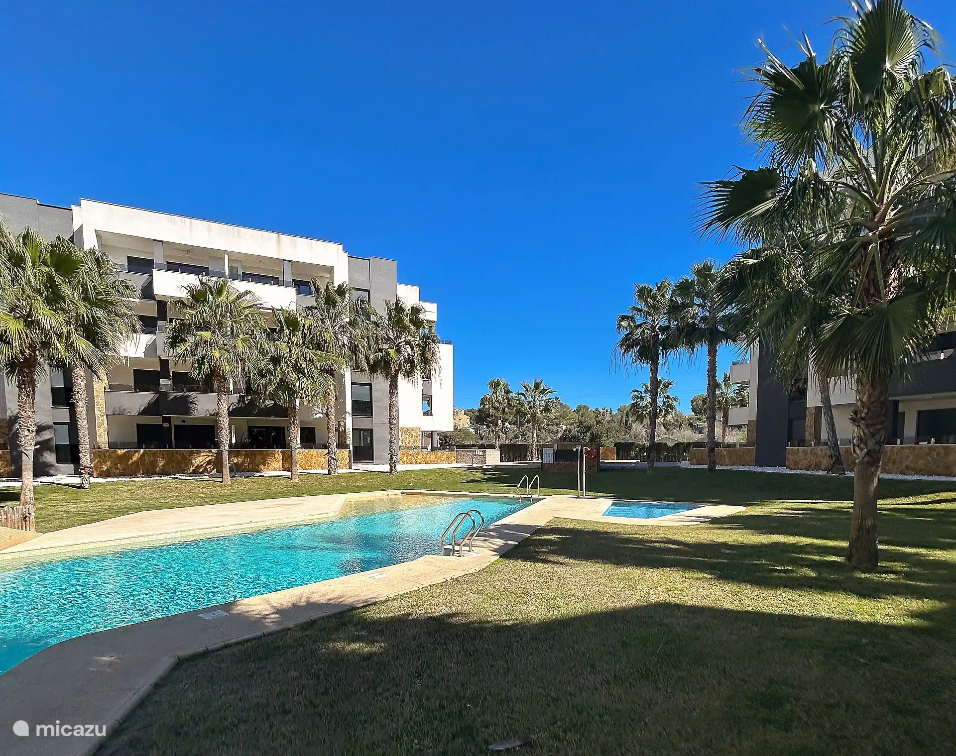 vakantiehuis huren in Spanje, Costa Blanca, Orihuela Costa – Luxe Appartement terras zwembadzicht