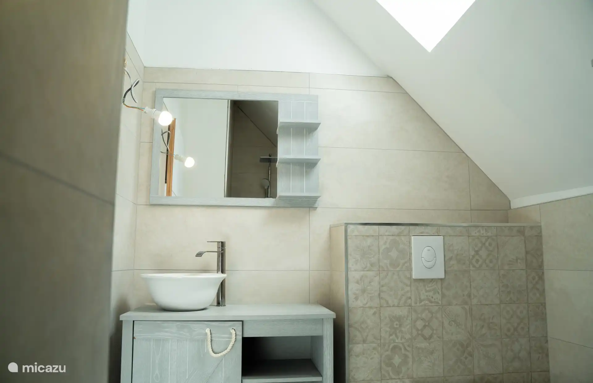 De badkamer