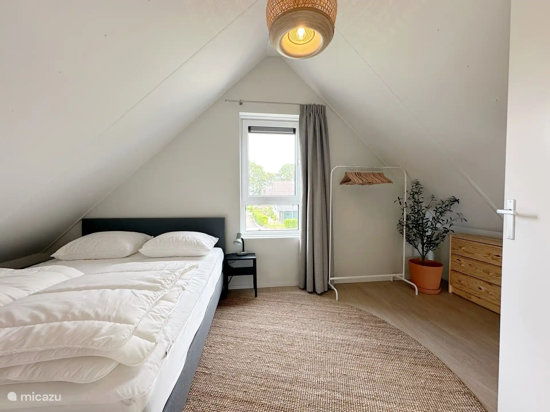 Slaapkamer met tweepersoonsbed