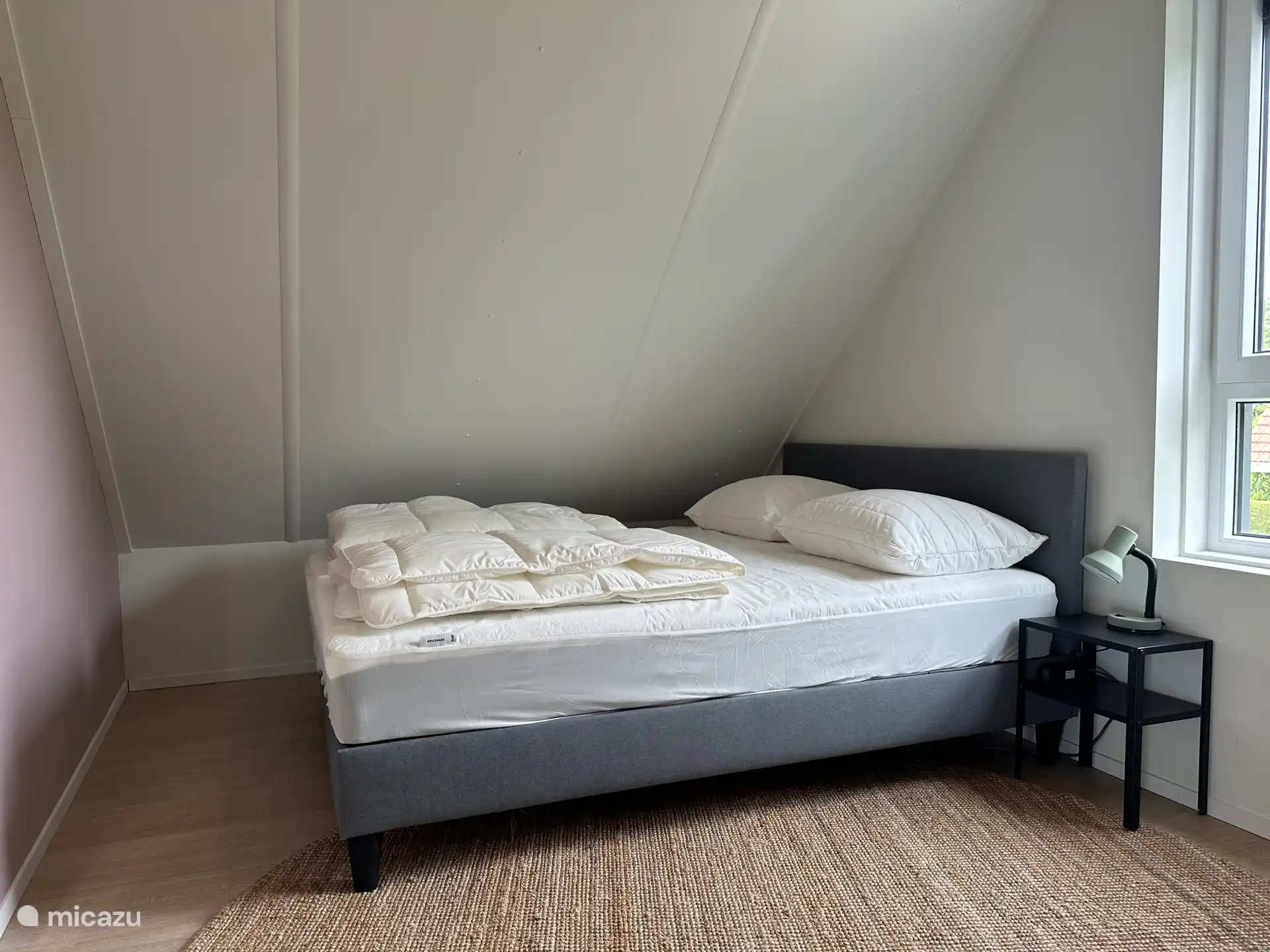 Slaapkamer met tweepersoonsbed