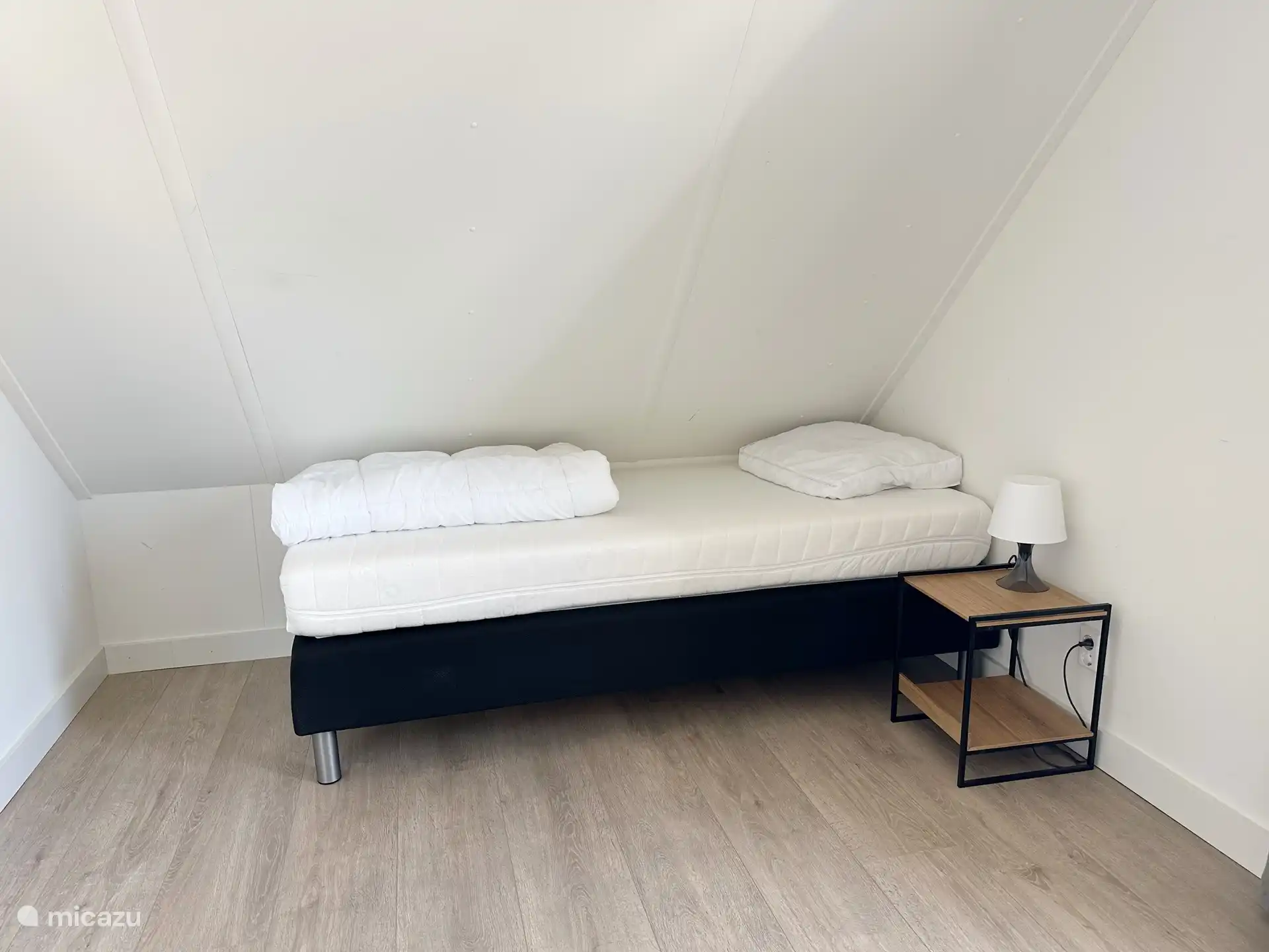 Slaapkamer met eenpersoonsbed