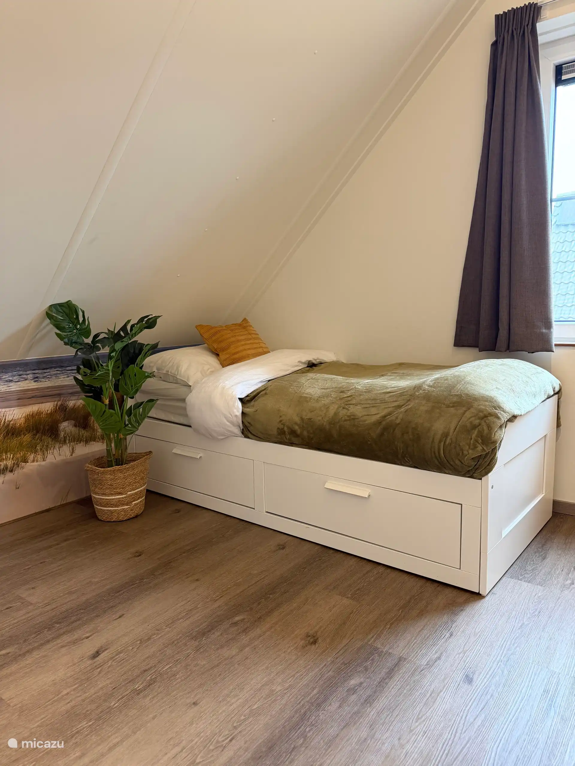 Slaapkamer met eenpersoonsbed