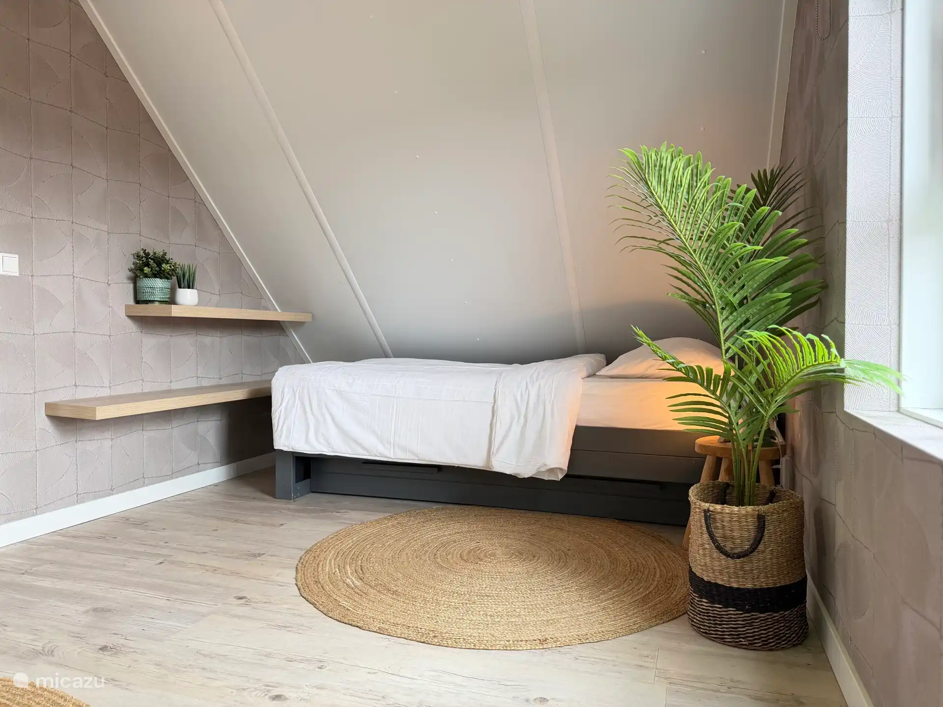 Slaapkamer met eenpersoonsbed