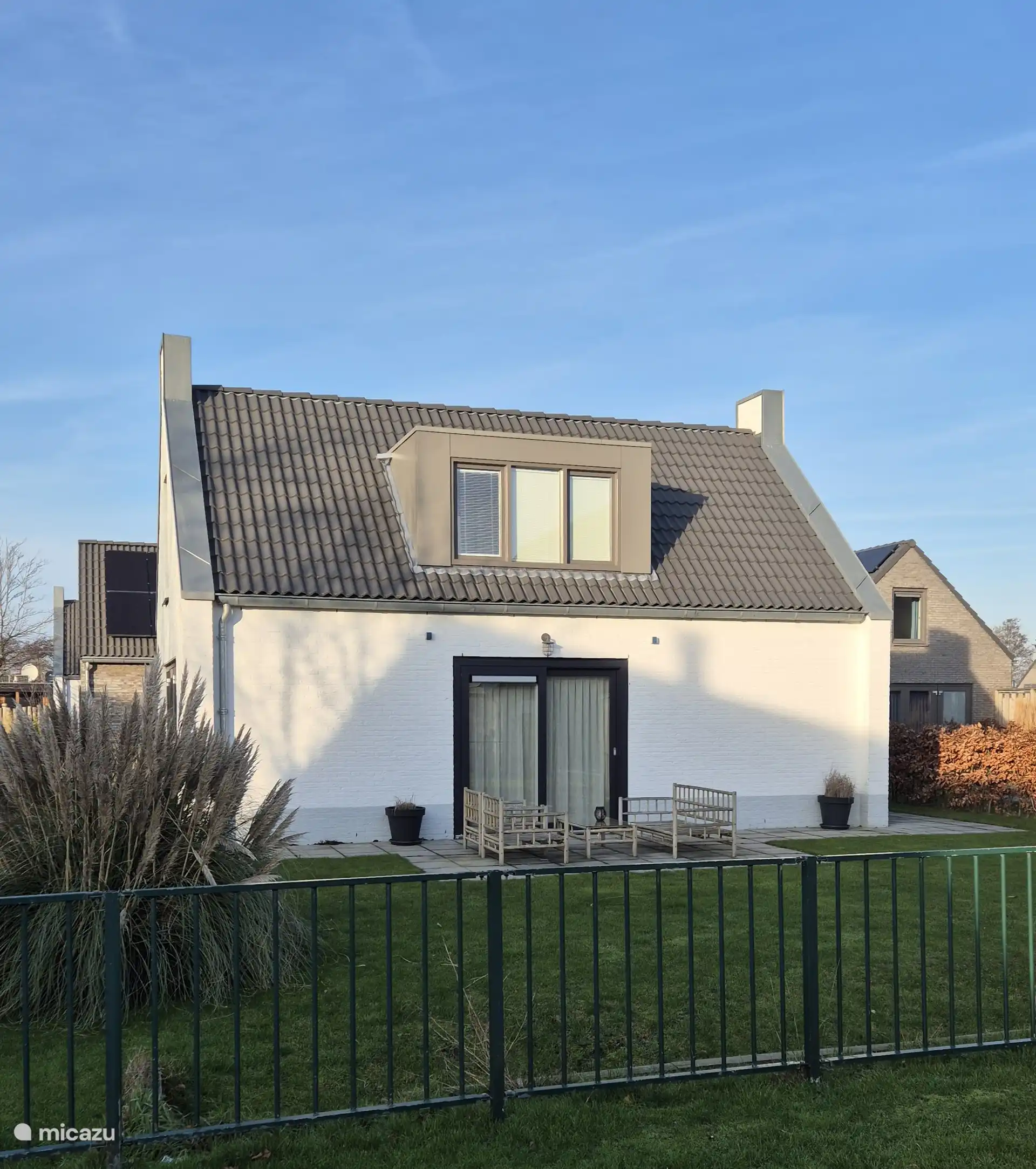 Woning achterzijde met tuin