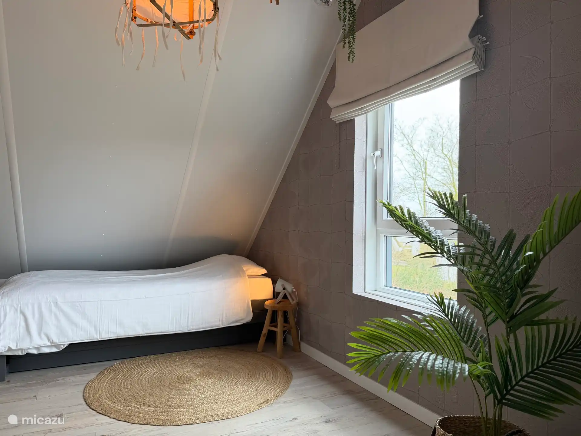 Slaapkamer met eenpersoonsbed