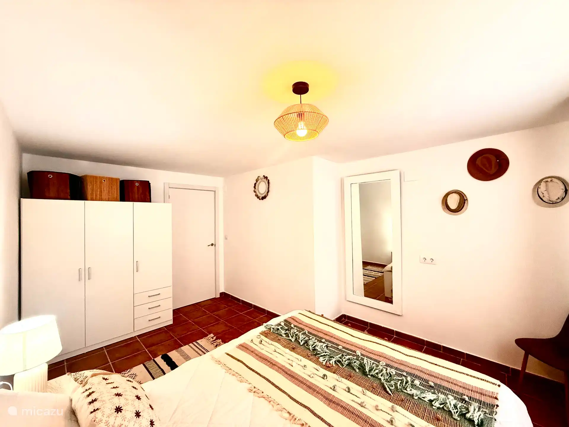 Large spacious Master bedroom with a double bed and a large wardrobe with plenty of storage space.