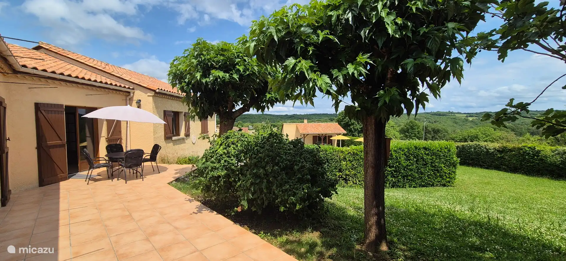 On the other side there is also a spacious terrace overlooking the pool, garden and countryside.