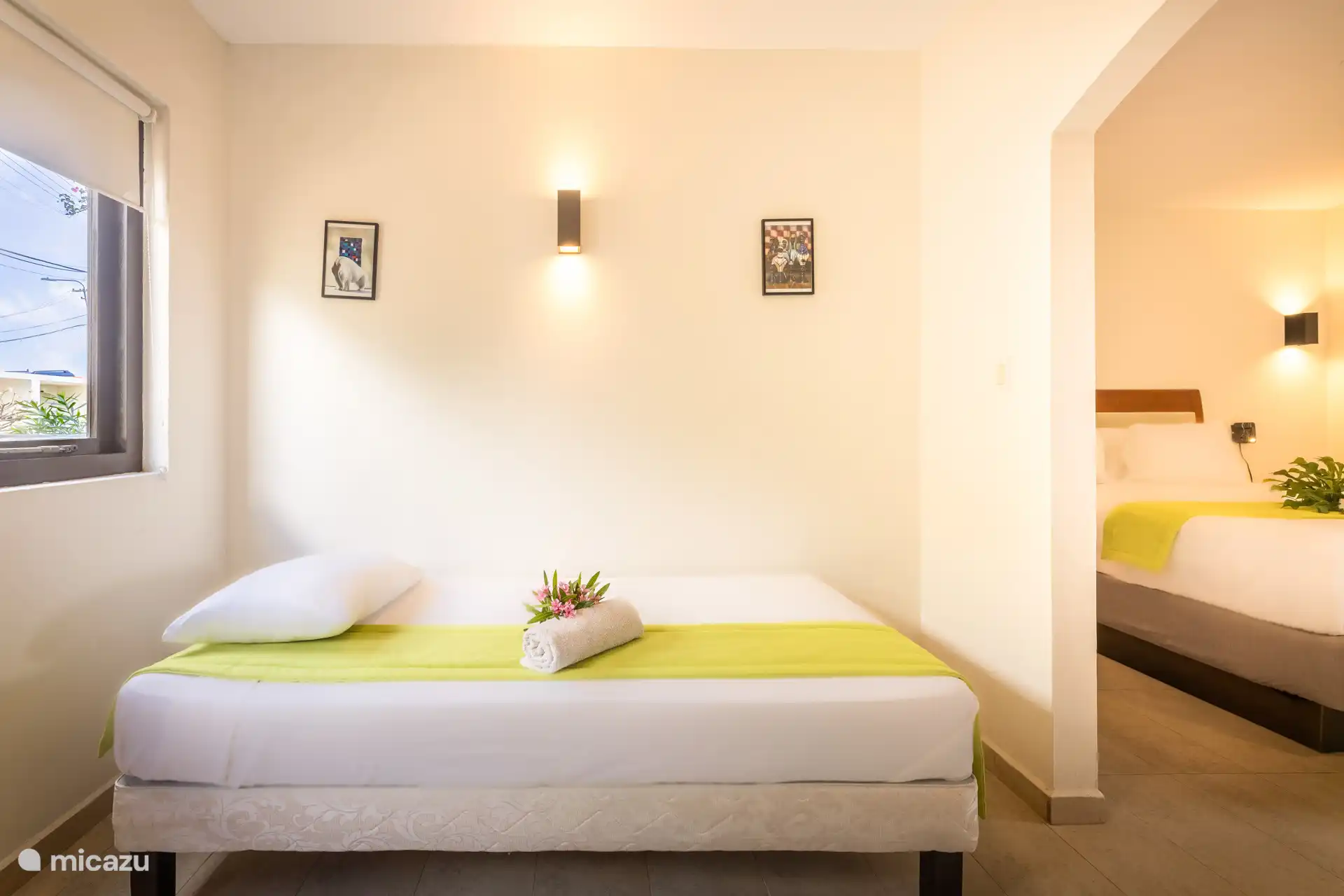 La suite junior dispone de cama king y individual, baño privado, armario y aire acondicionado