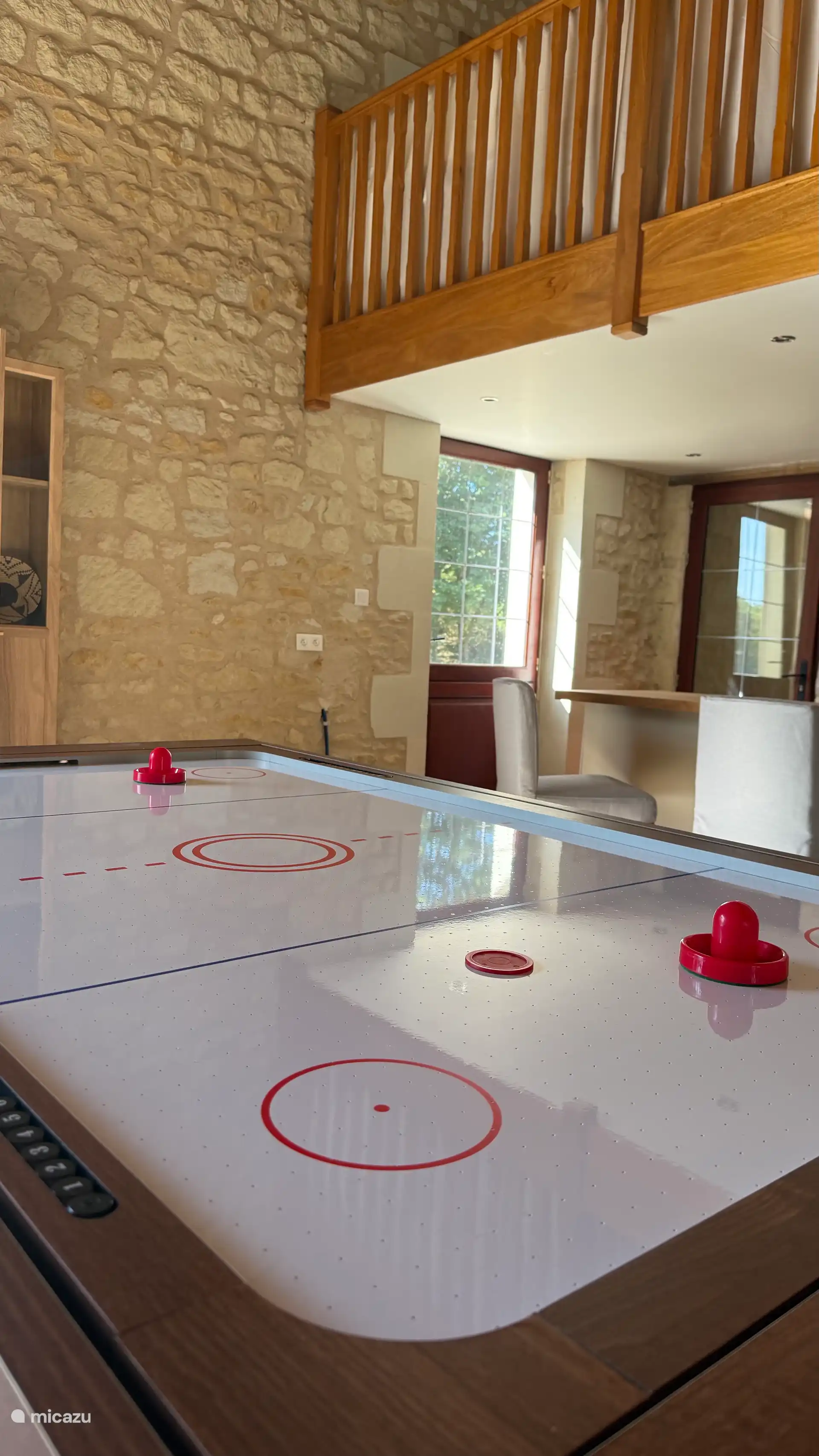 The bar with the air hockey setup. 