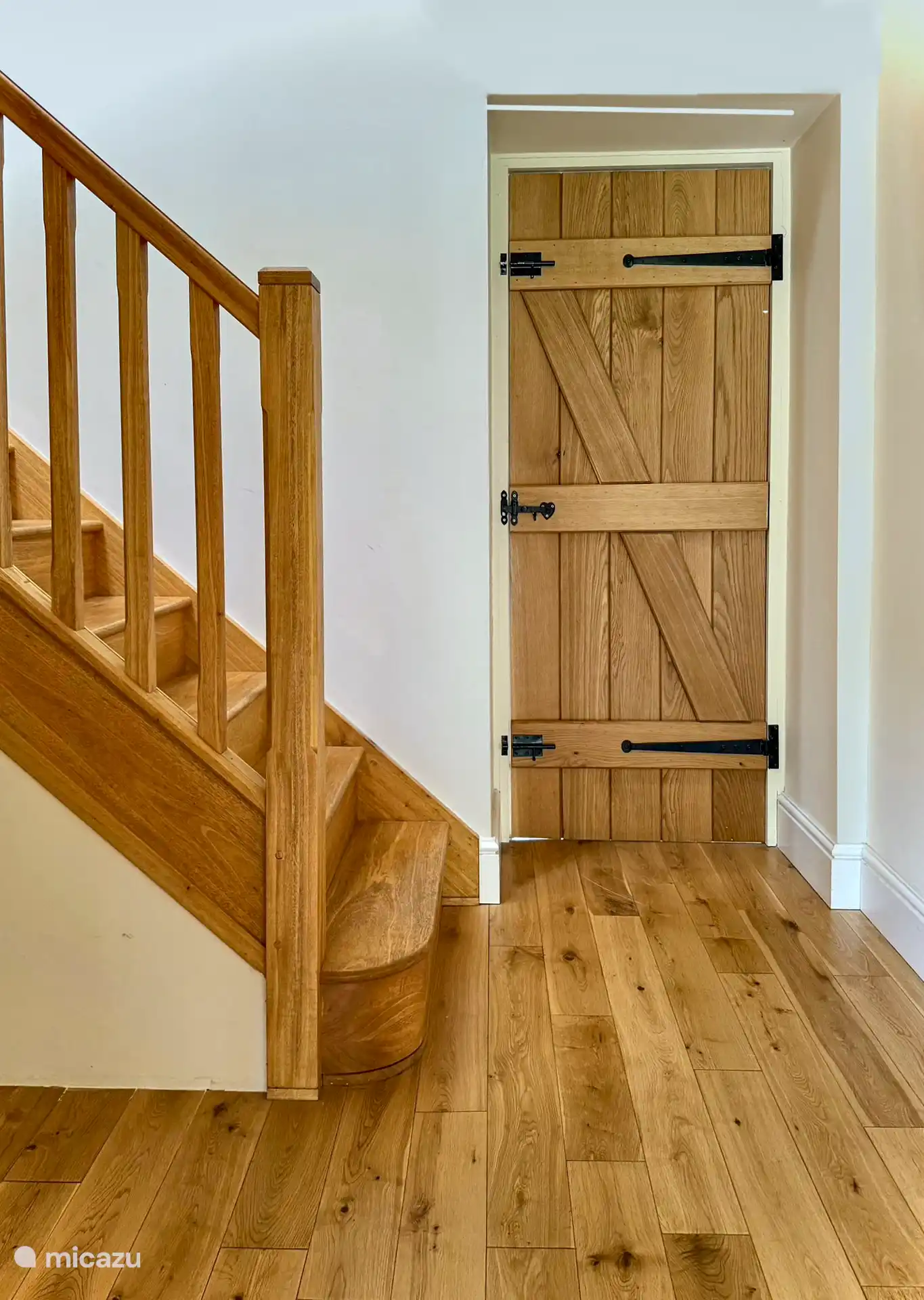 The Hallway and the stairs in the Almond View Apartment. 