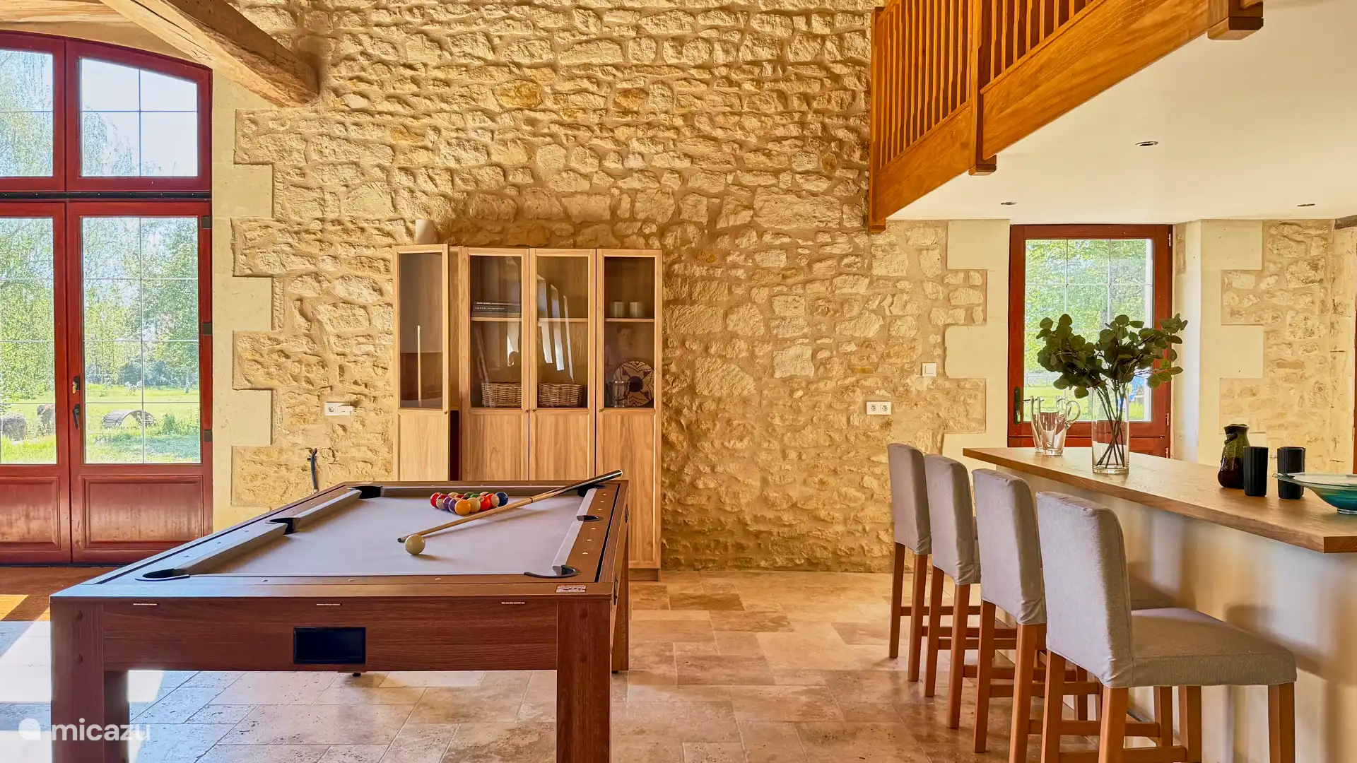 The Bar with the Pool table. The Pool Table turn into ping pong and Air Hockey. 