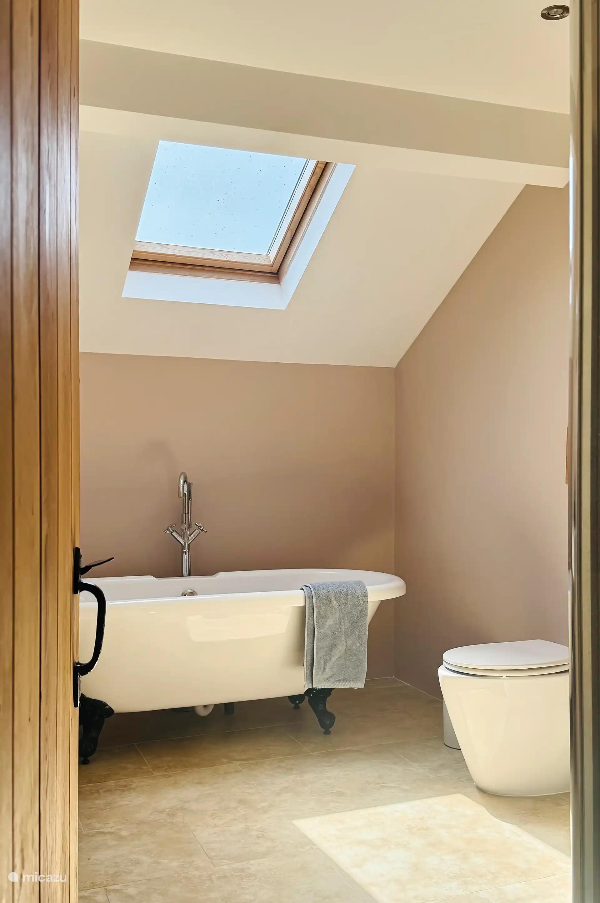 Bathroom Upstairs  in the Almond View Apartment, with a sky window. 