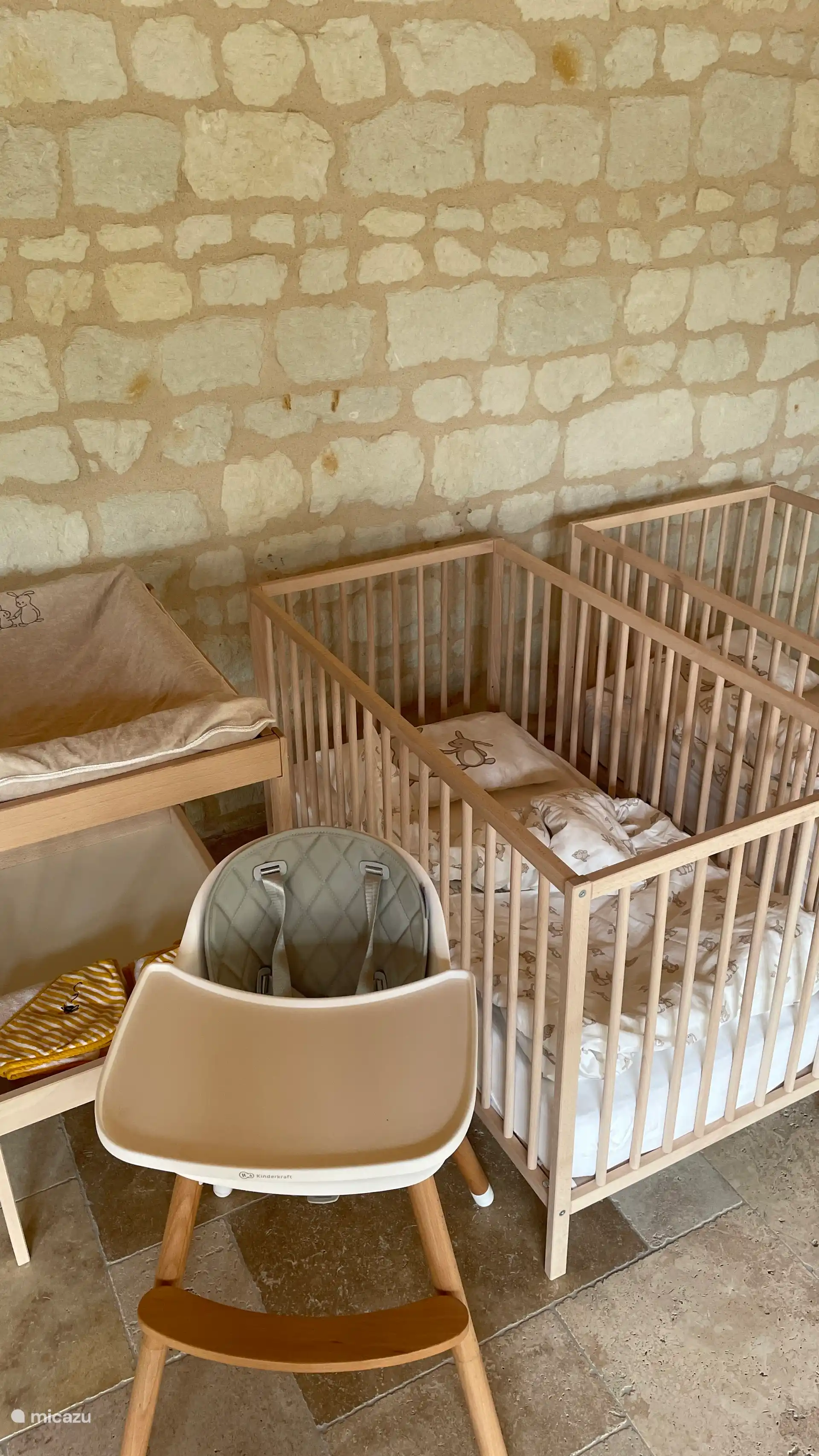Baby cots (x2), a baby changing table/dresser (1), and a high chair. 