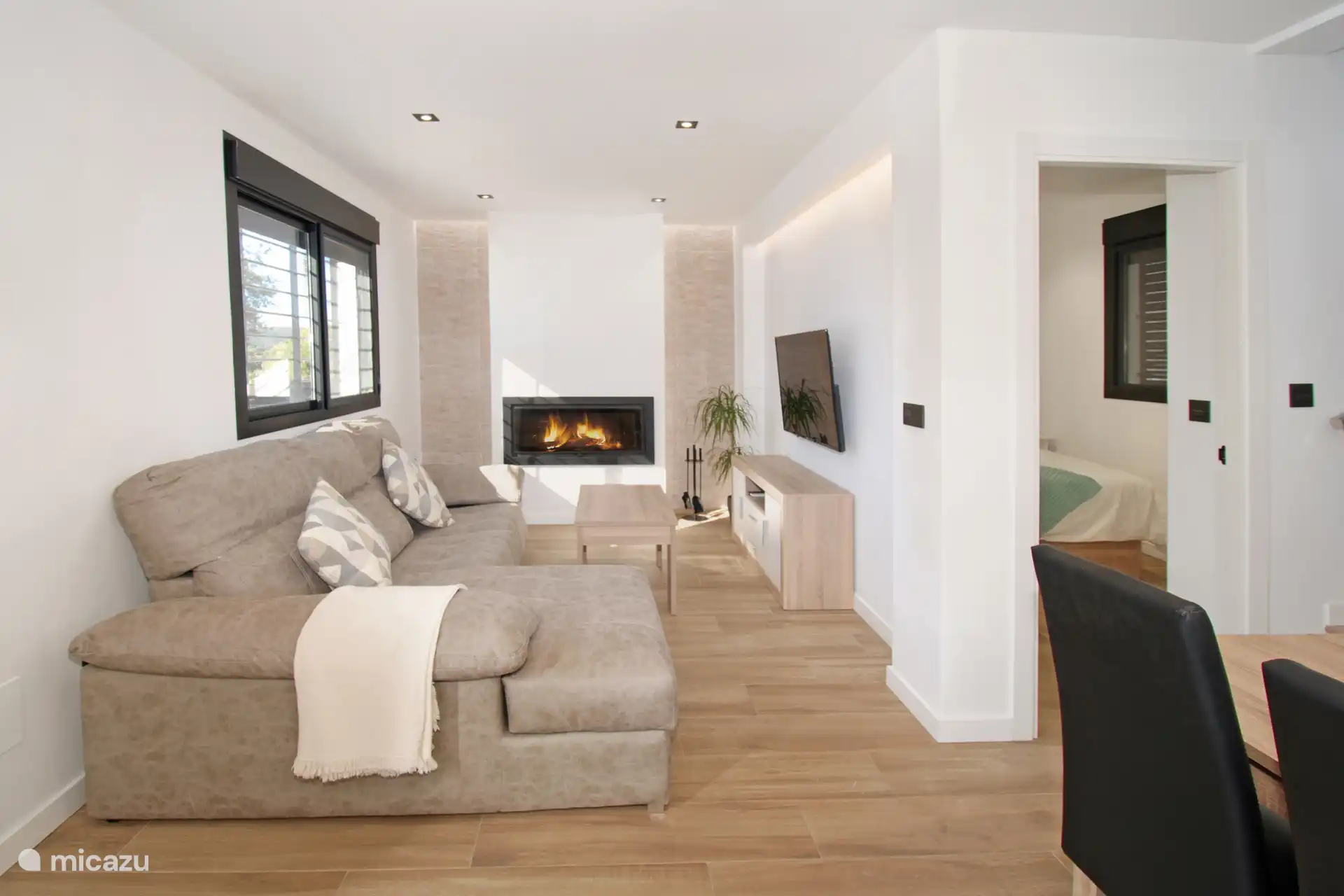 A comfortable salon with smart TV and modern wood burner for cooler evenings. Conviviality is key. 