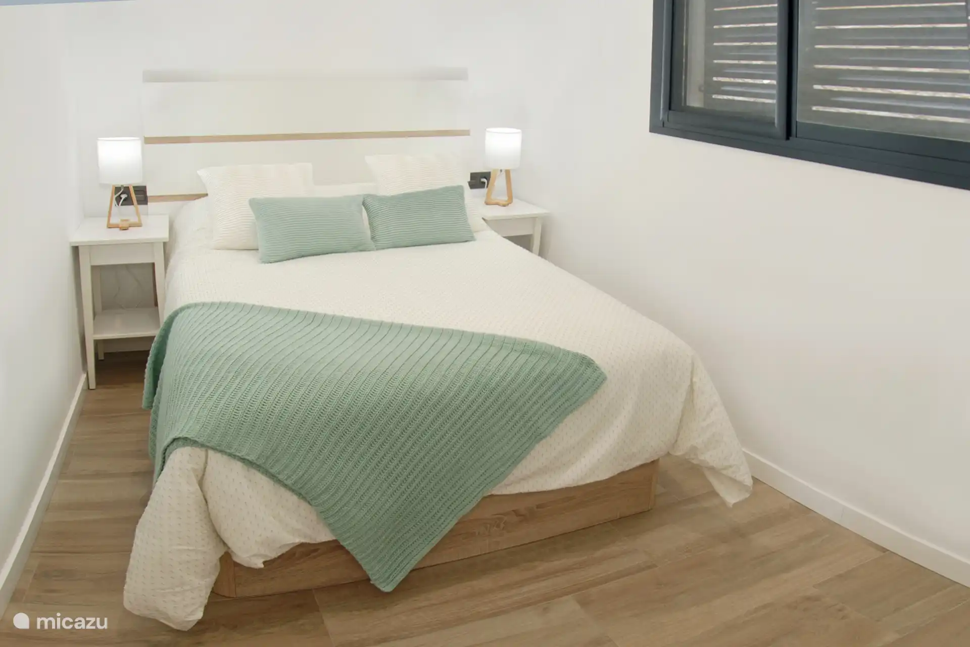 One of the 2 bedrooms on the ground floor.