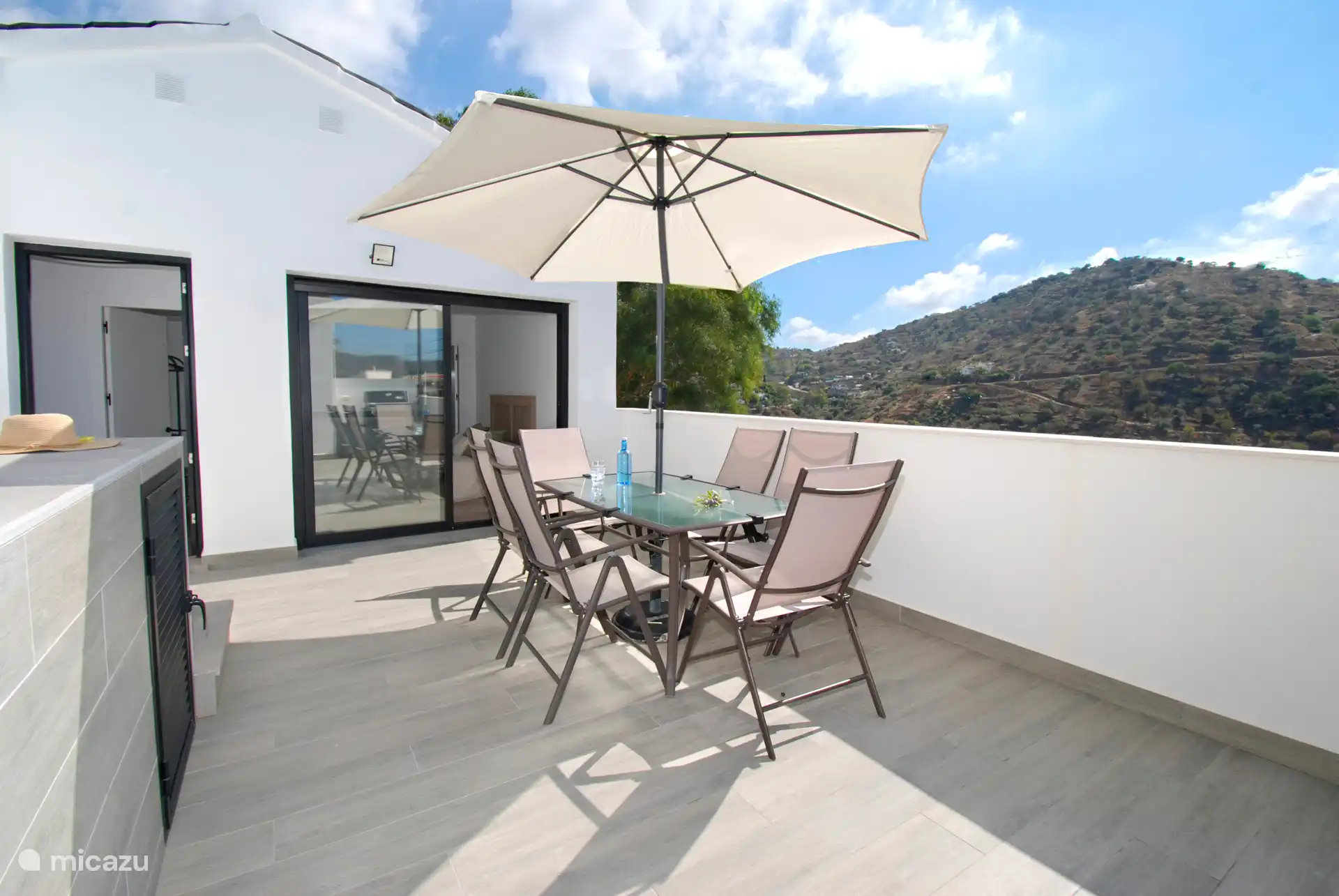 You reach the terrace through a separate door or through the master bedroom. 