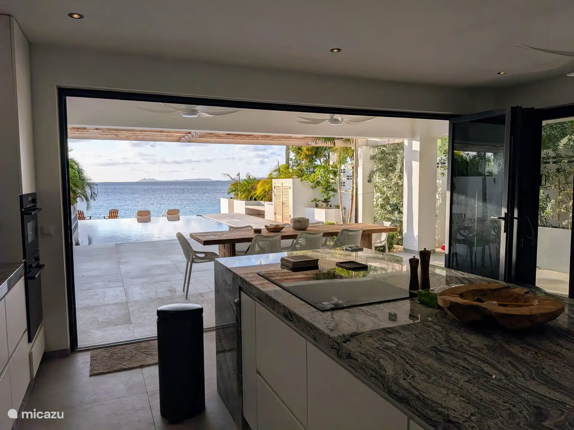 From the kitchen you look towards the terrace.