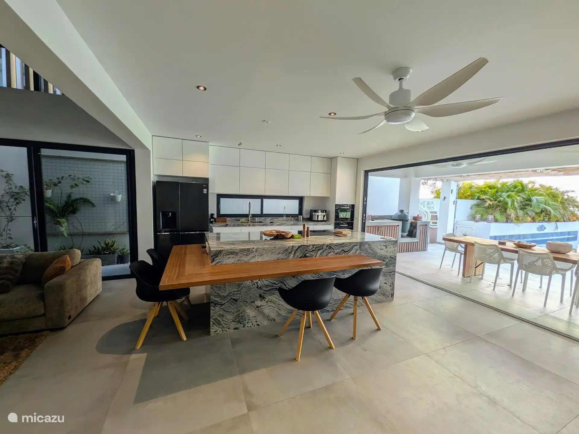 Kitchen and dining area for shared meals.