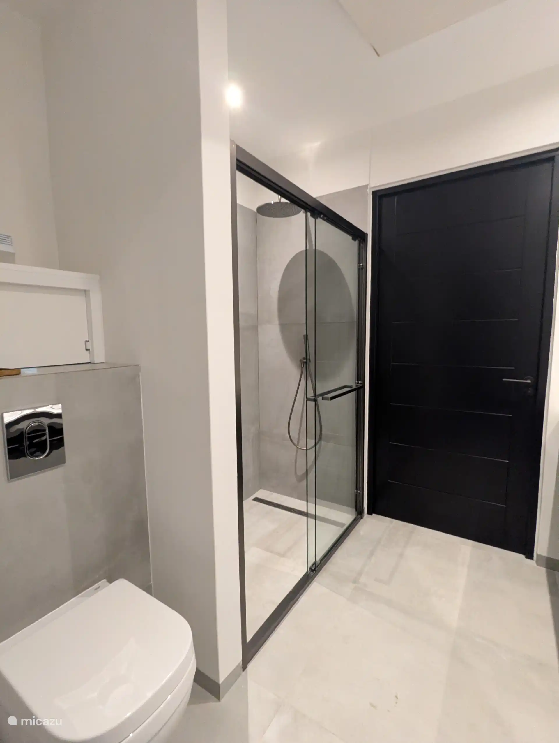 Shower in the shared bathroom upstairs.