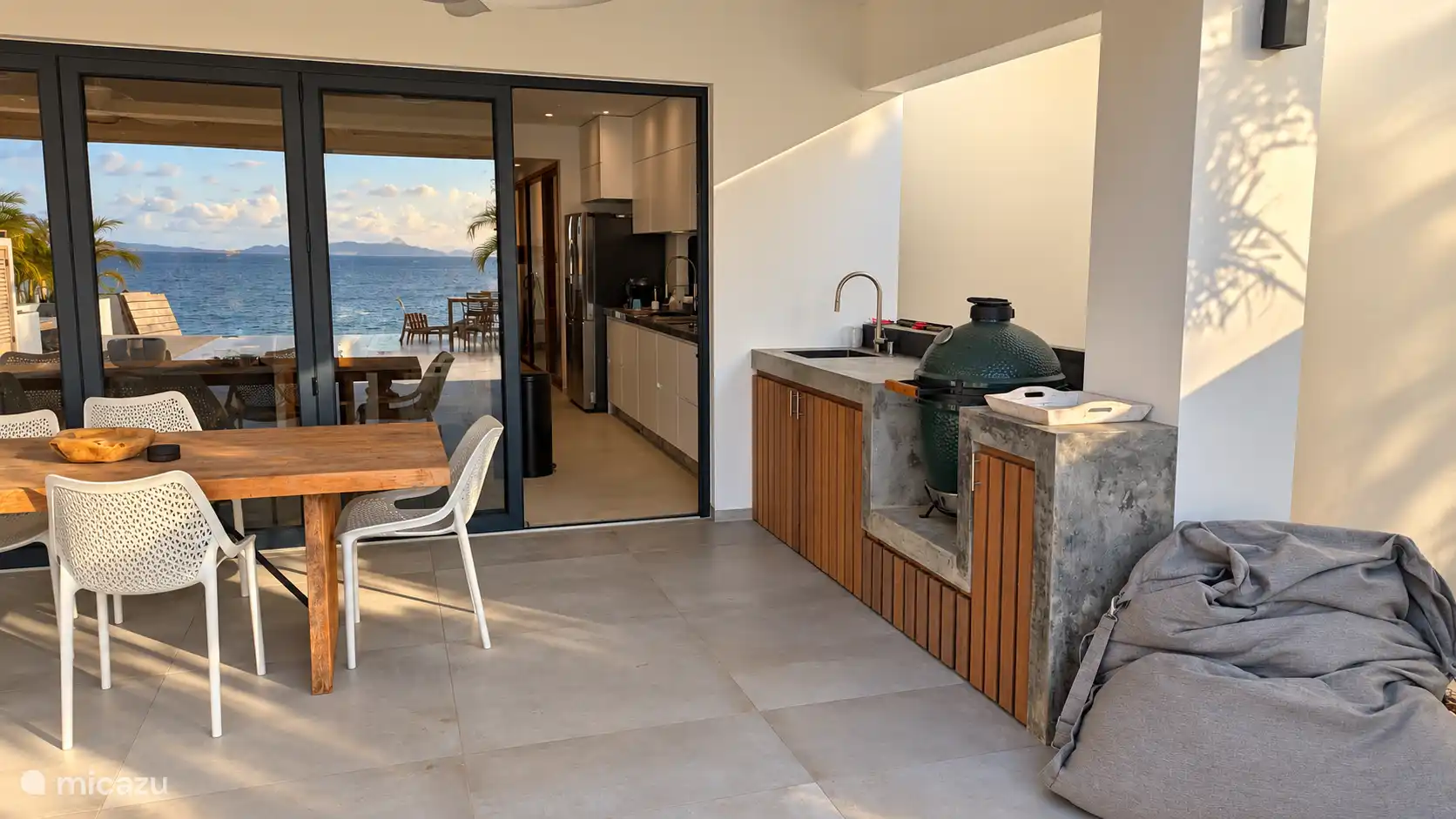 Covered porch with outdoor kitchen.