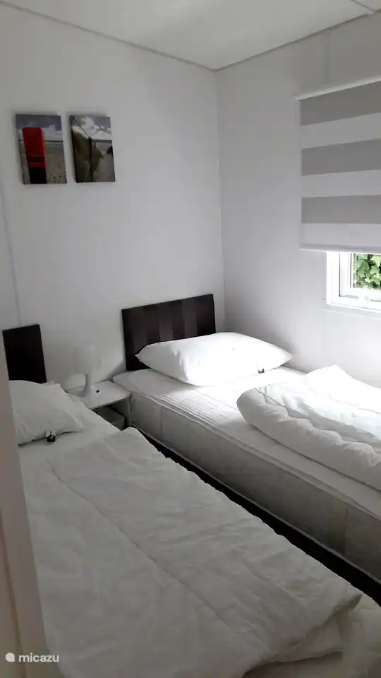 Schlafzimmer 2 mit 2 Einzelbetten.