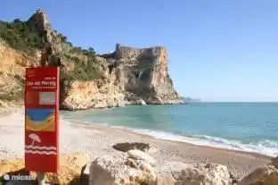 The beach at the Cumbre del Sol, on an idyllic bay