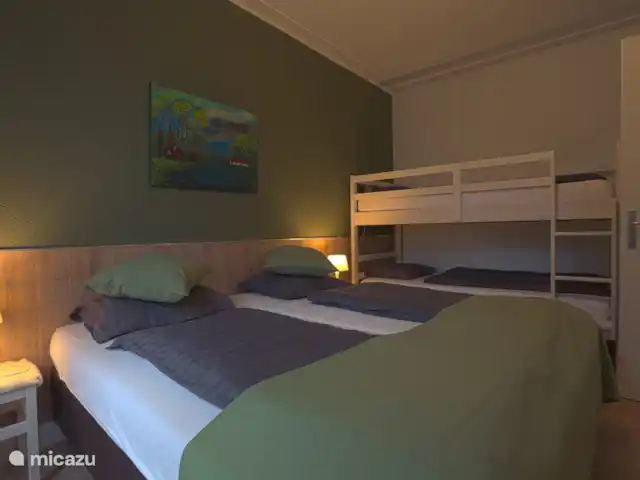 El Looische Hoeve en Países Bajos, Limburgo, Wellerlooi - casa de campo gran dormitorio para 4 personas en la planta baja con vistas al jardín.